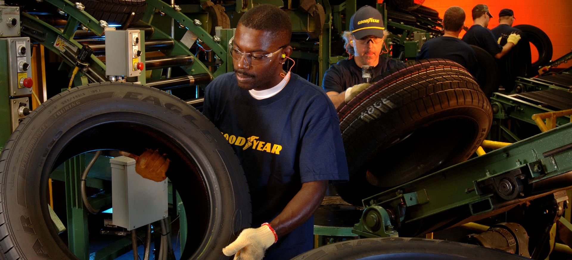 Line Of Goodyear Workers Wallpaper