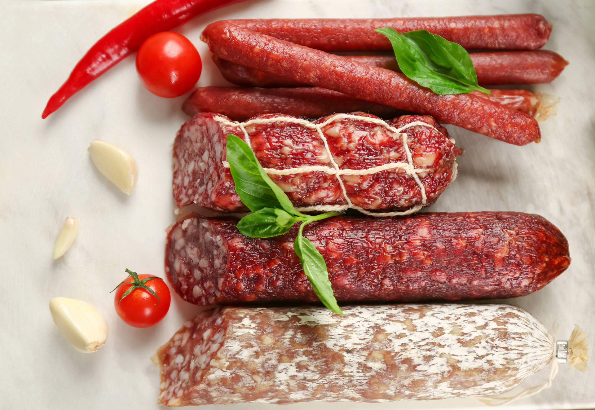 Lined Different Sausage Meat With Cherries Wallpaper