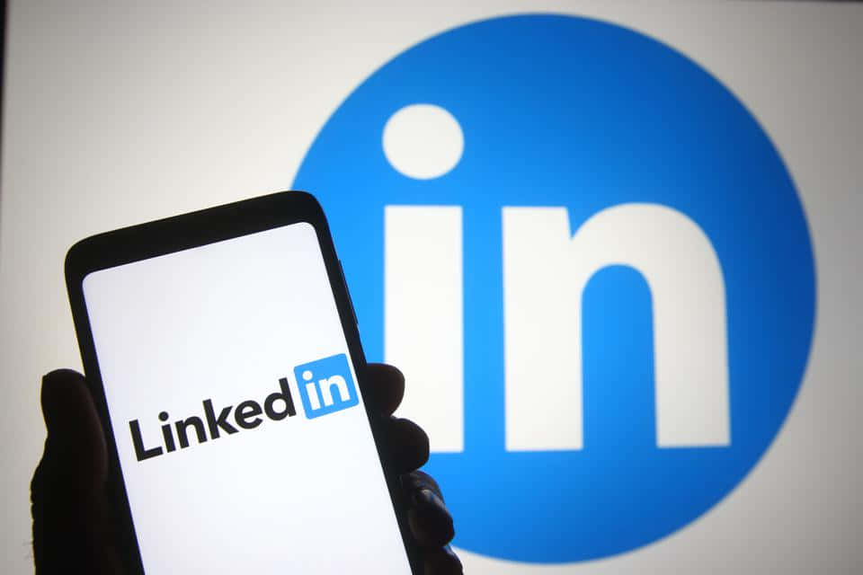 Linkedin's New Logo Is Displayed On A Smartphone