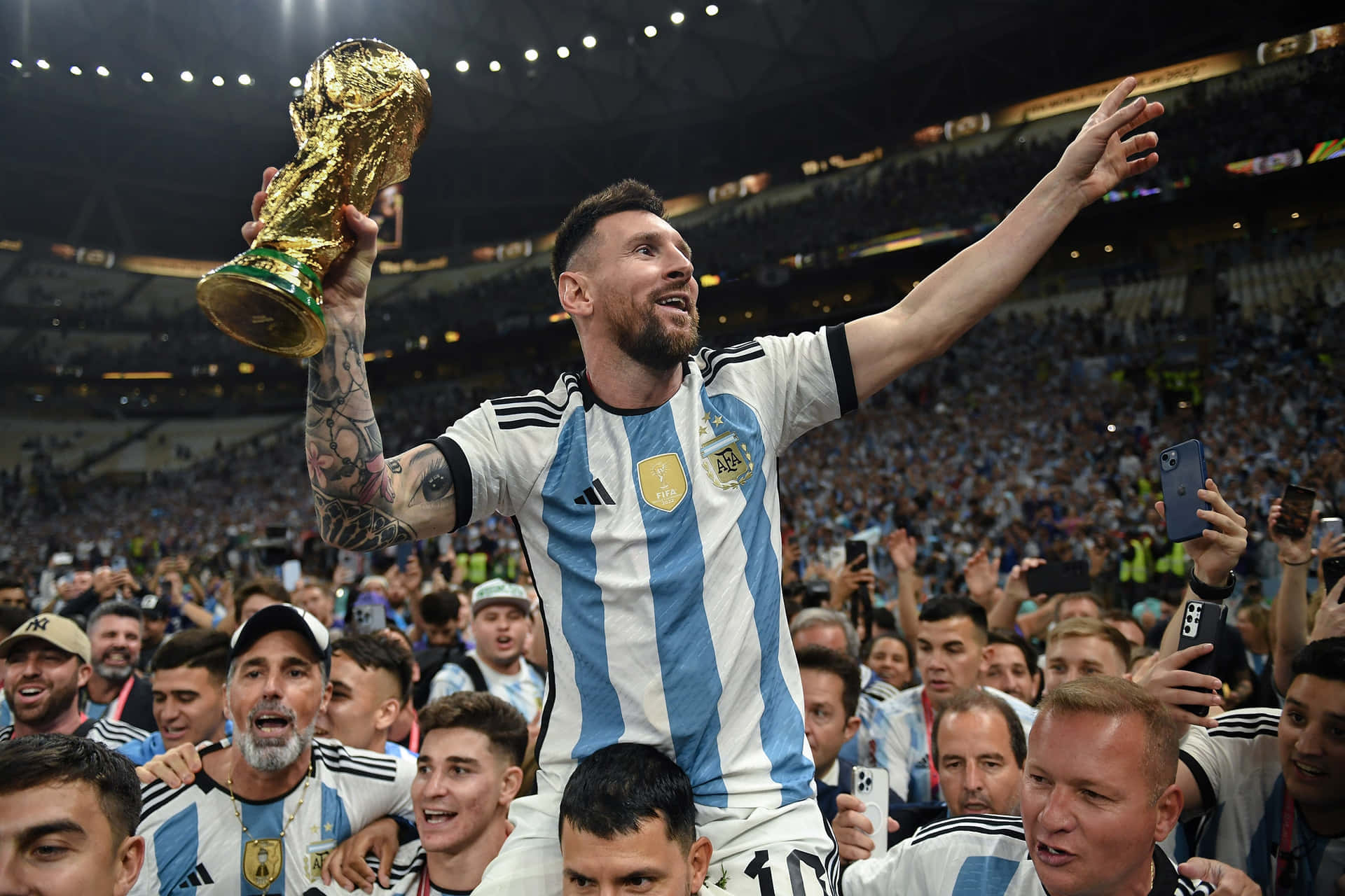 Lionel Messi Celebrating World Cup Victory Wallpaper