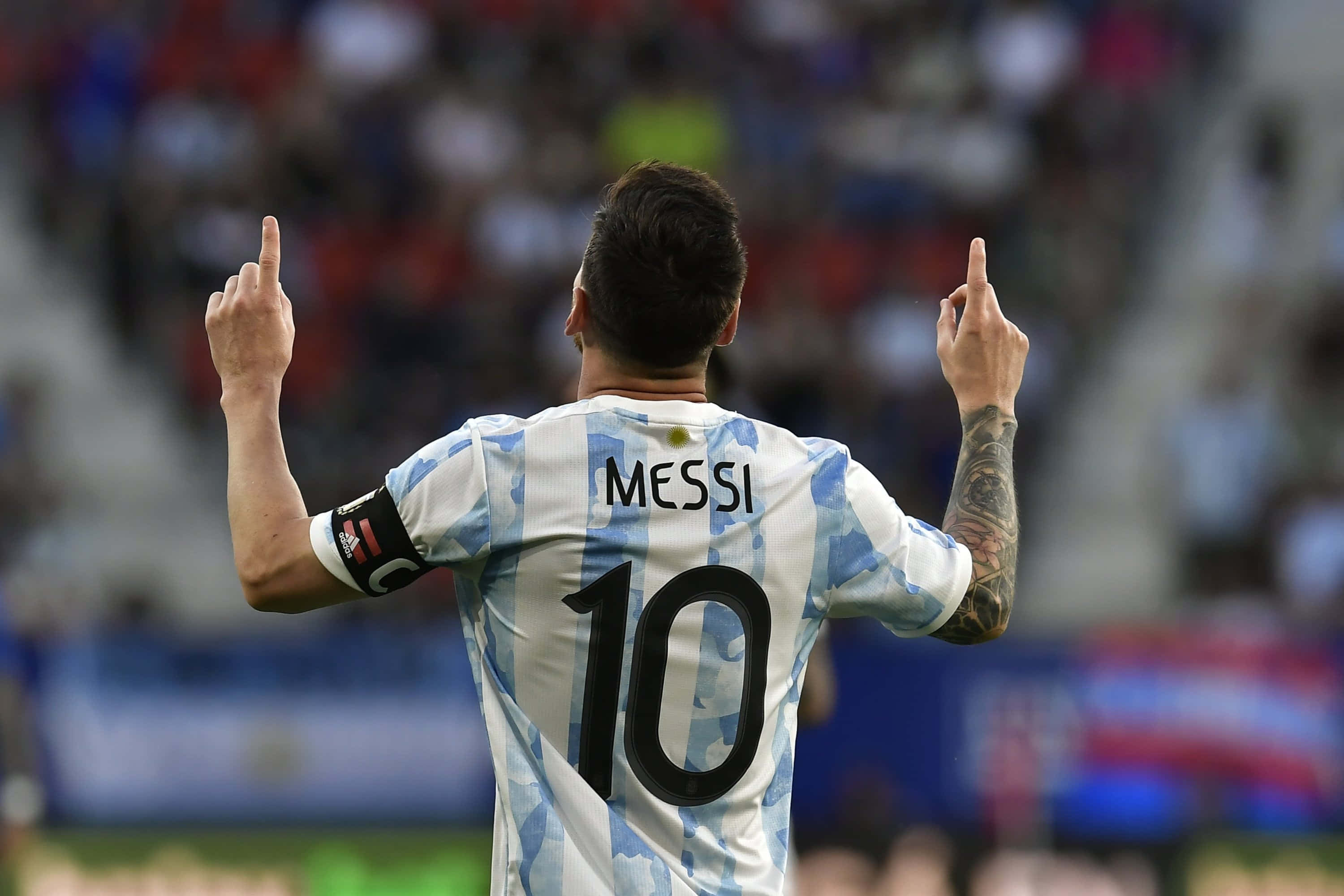 Lionel Messi In Action At The World Cup Wallpaper