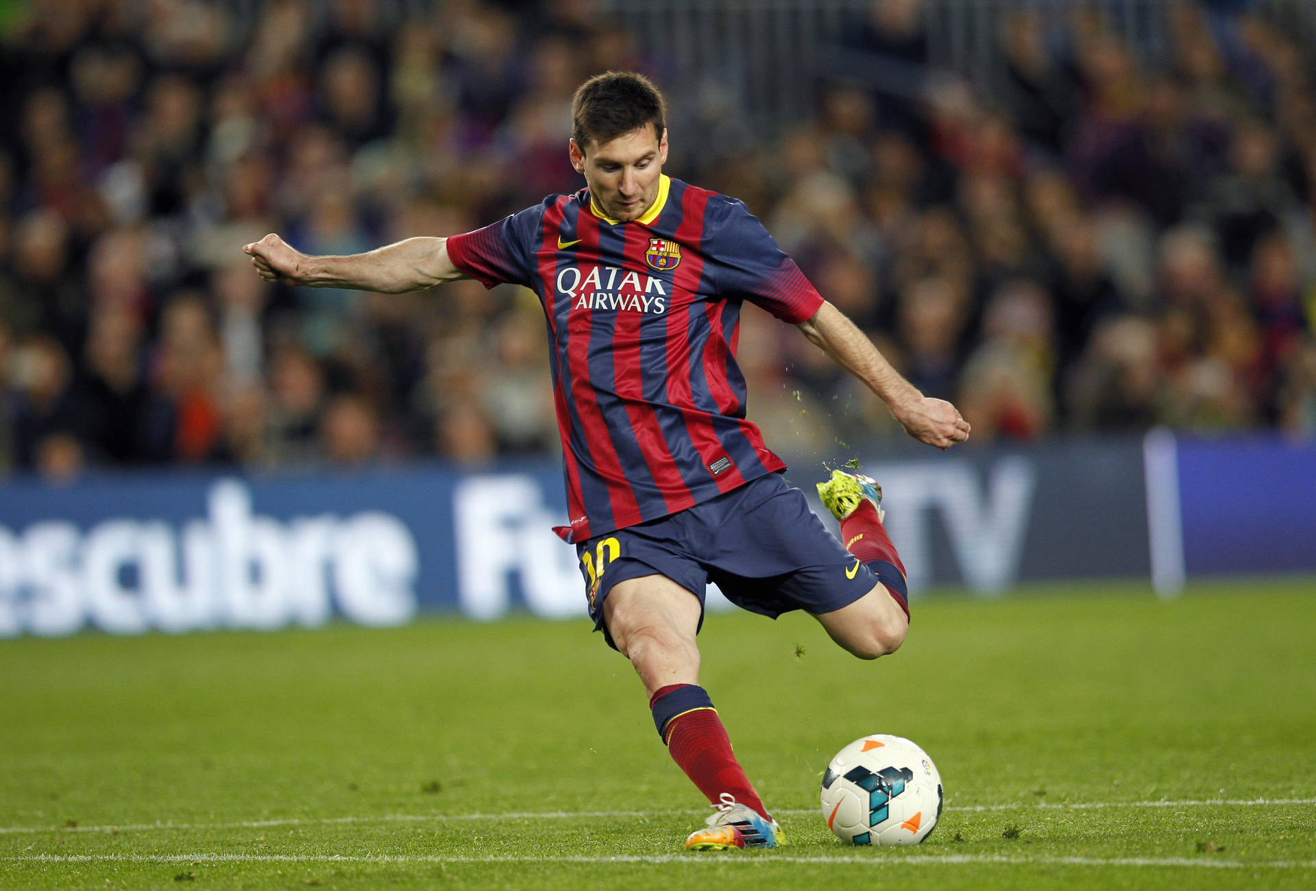 Lionel Messi Kicking A Ball Wallpaper