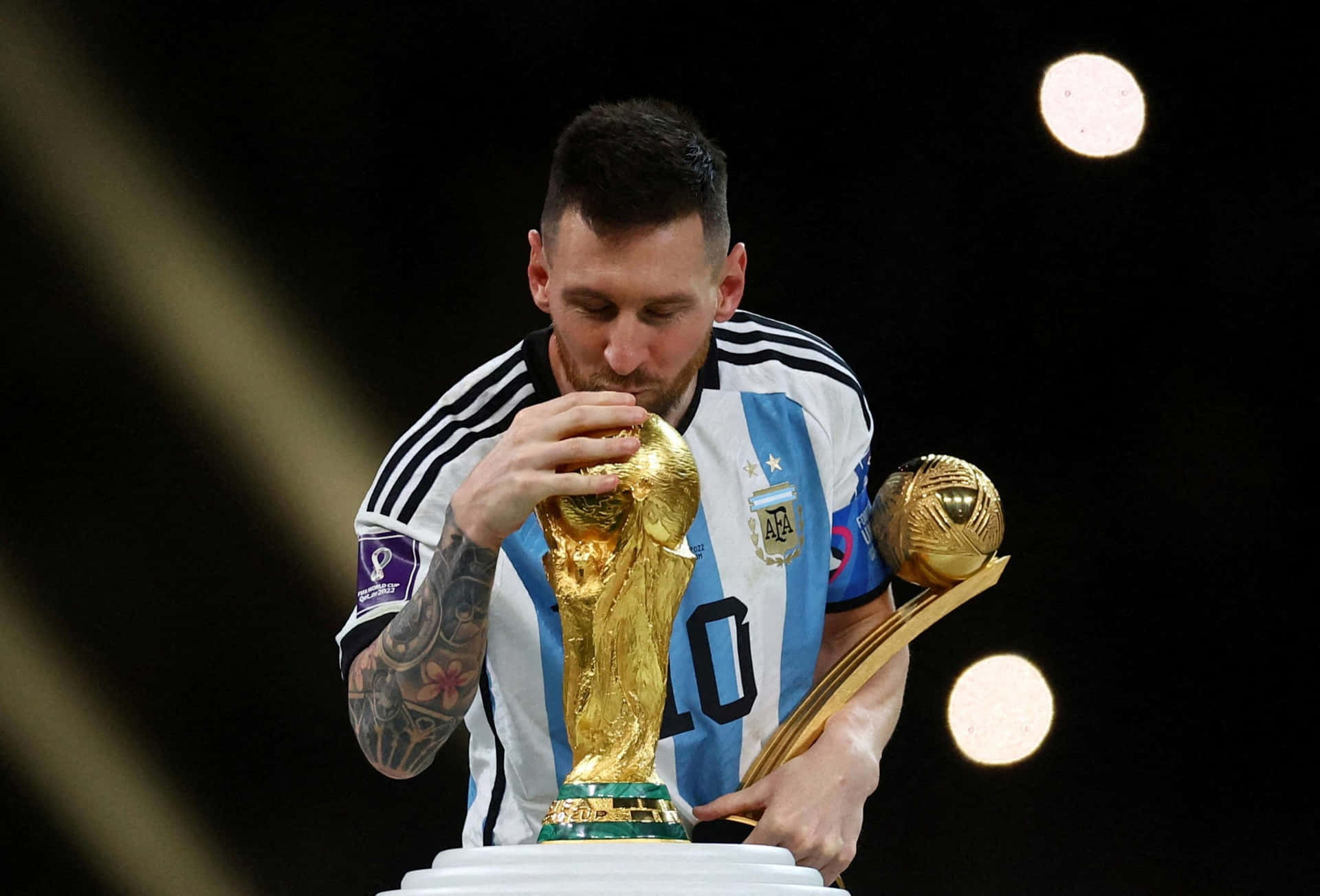 Lionel Messi Kissing World Cup Trophy Wallpaper