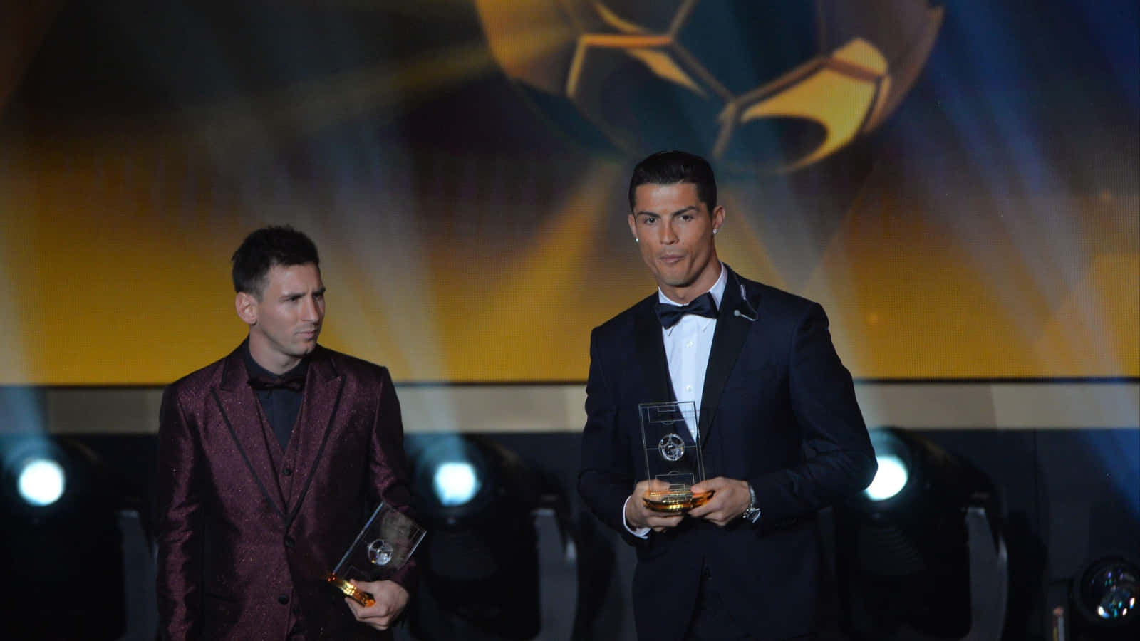 Lionel Messi With His Ballon D'or Award Wallpaper