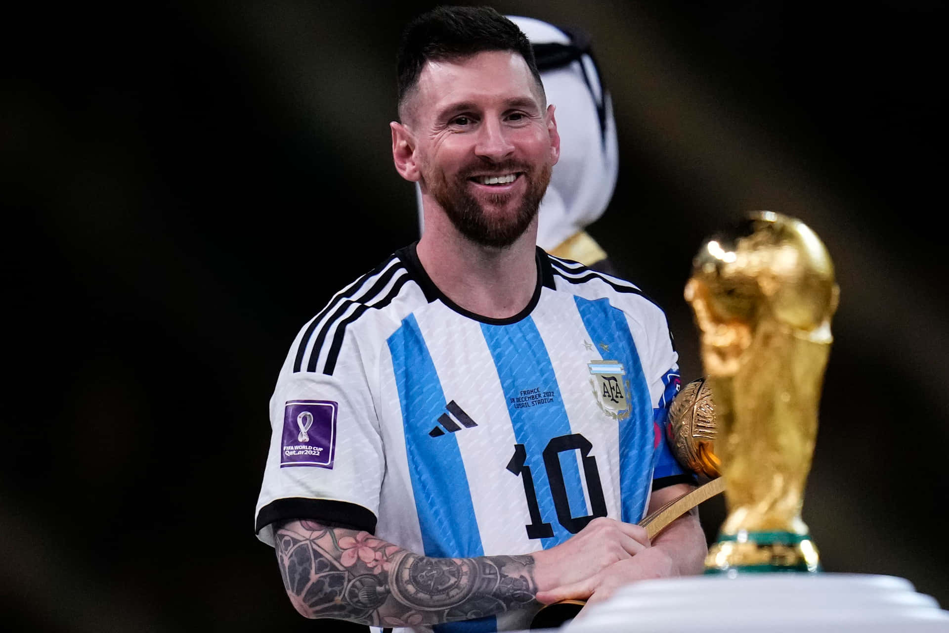 Lionel Messiwith World Cup Trophy Wallpaper