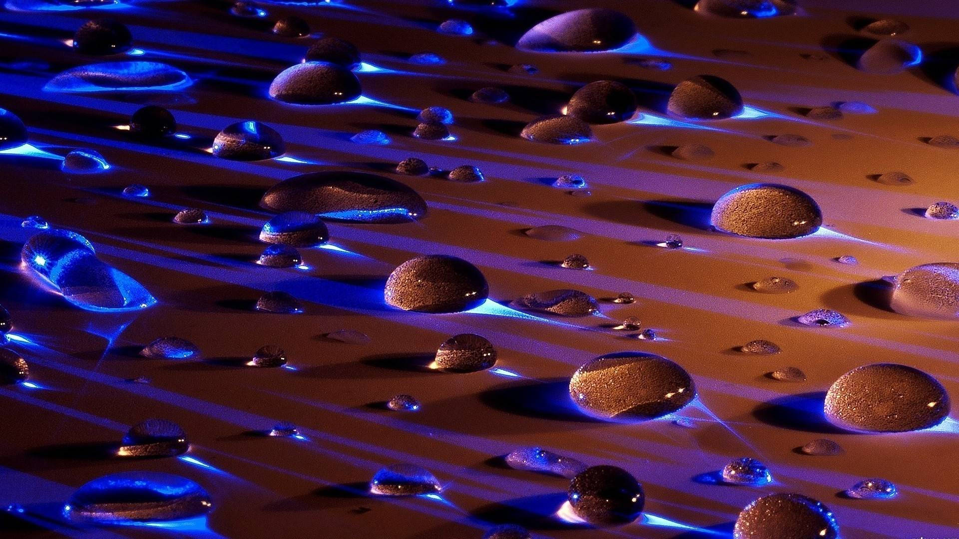 Liquid Blue Light Droplets Wallpaper