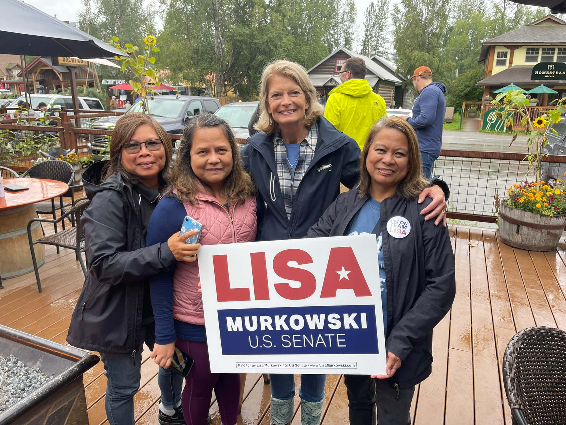 Senator Lisa Murkowski Hugging Supporters Wallpaper