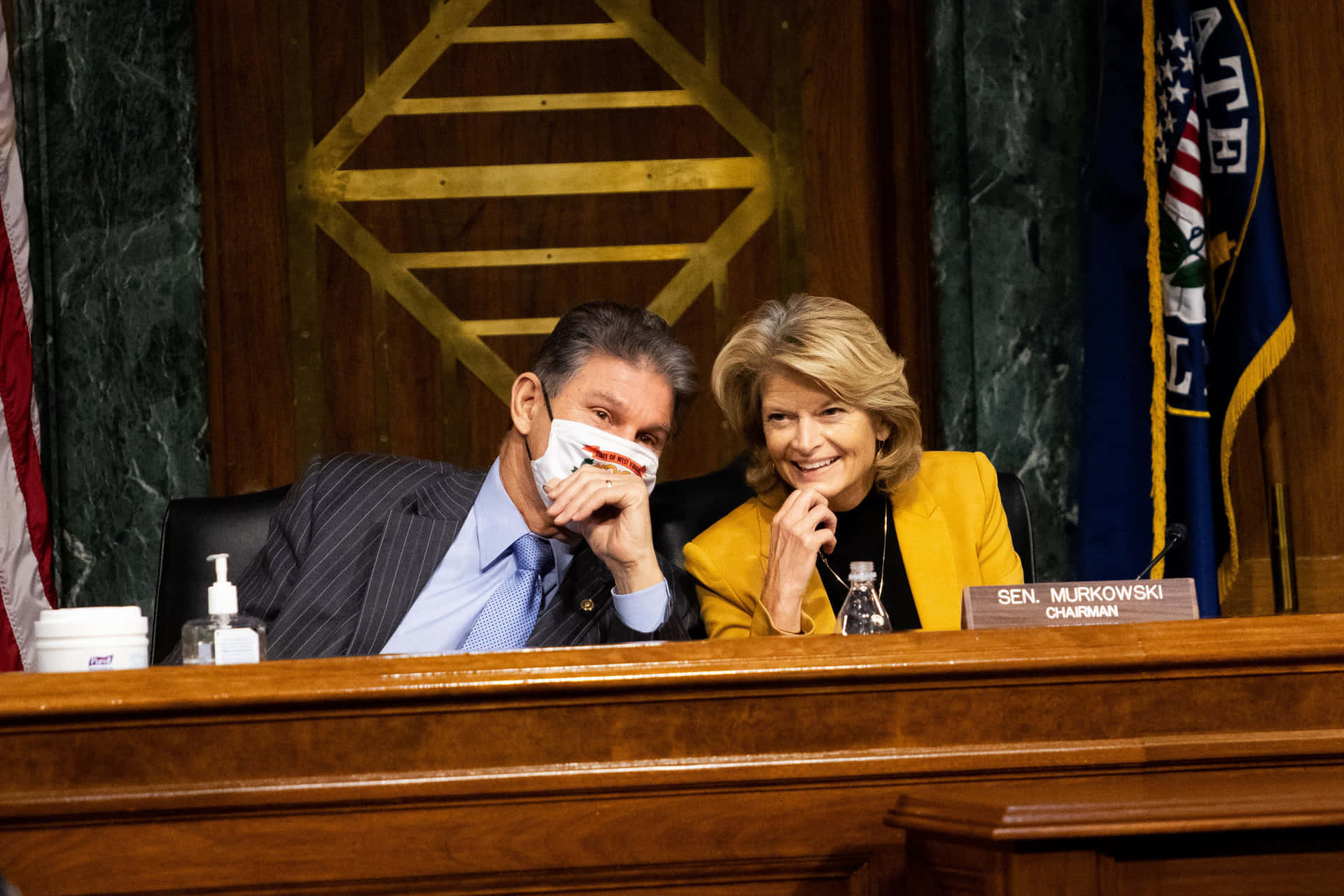U.S. Senator Lisa Murkowski sharing a laugh with a colleague Wallpaper