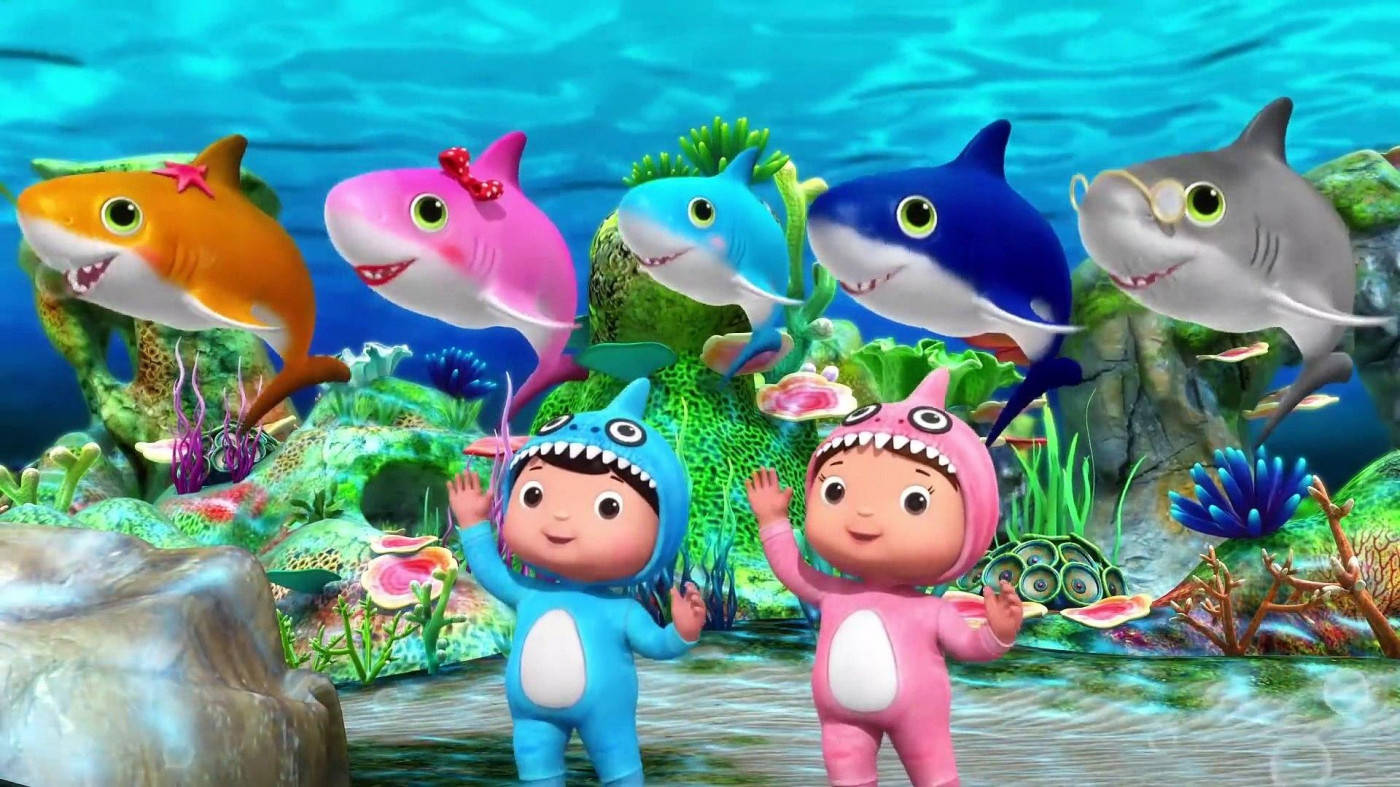 Pequeñobaby Bum Con Baby Sharks Fondo de pantalla