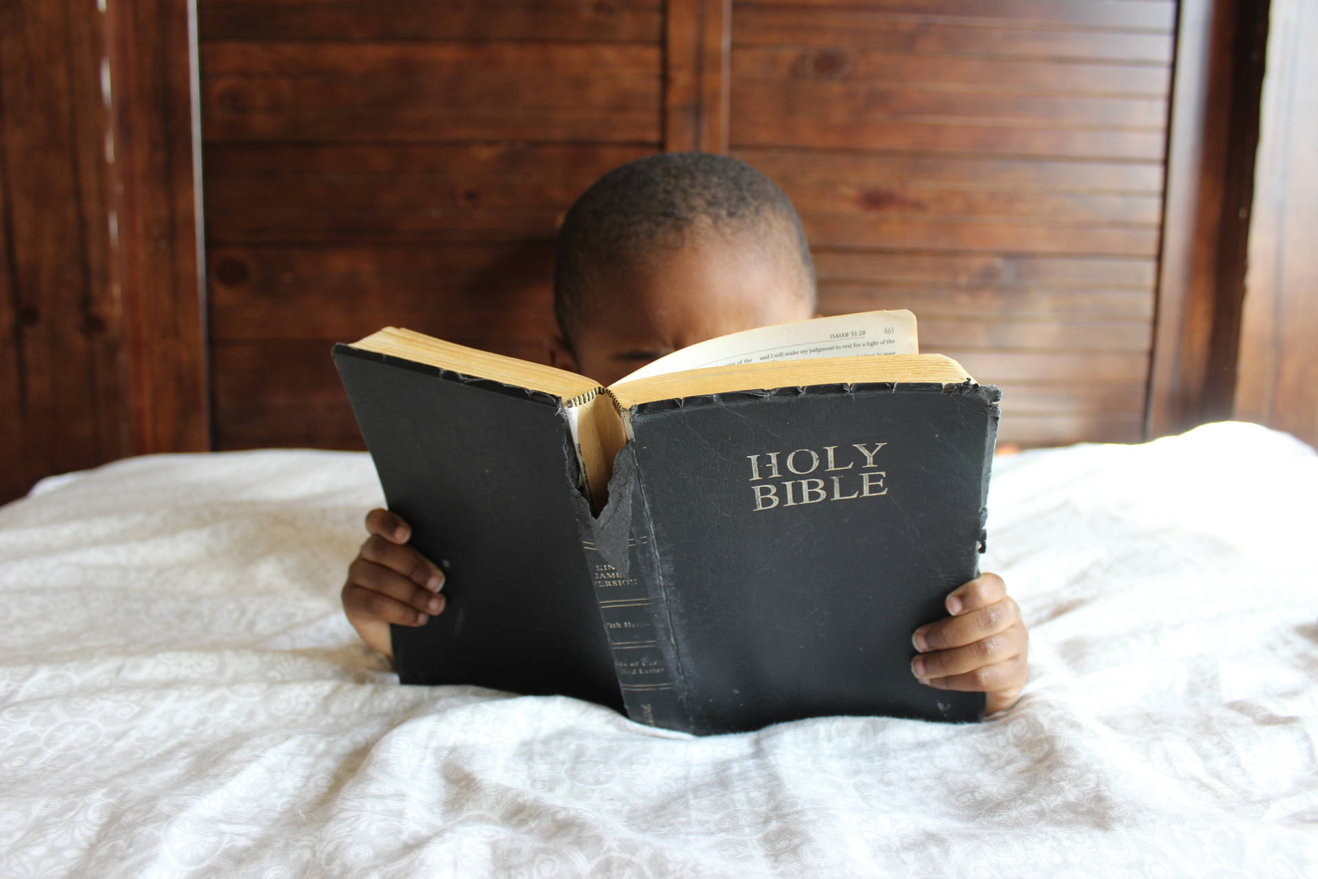 Little Boy Reading Holy Bible