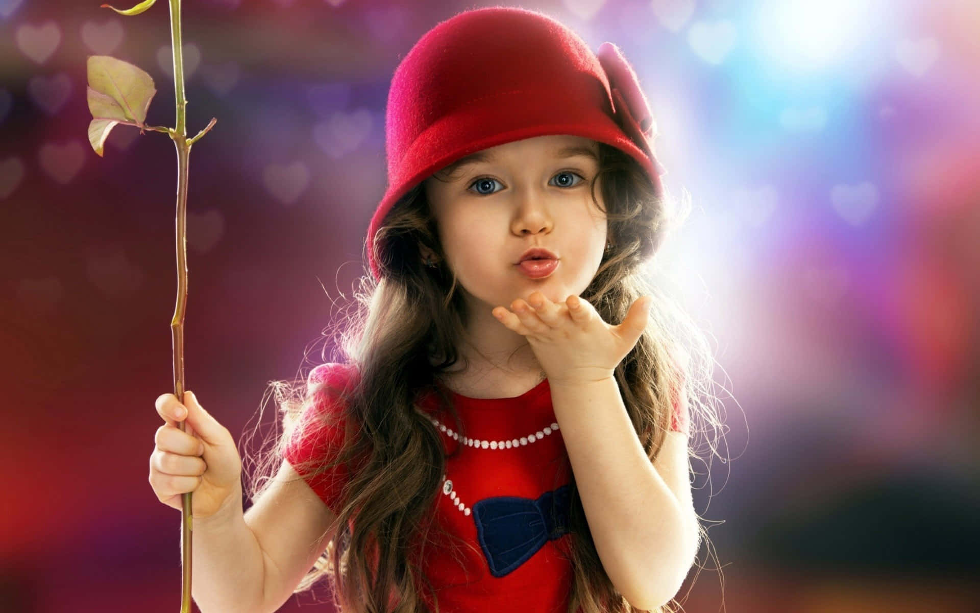 Little Girl Blowing Kissin Red Hat Wallpaper