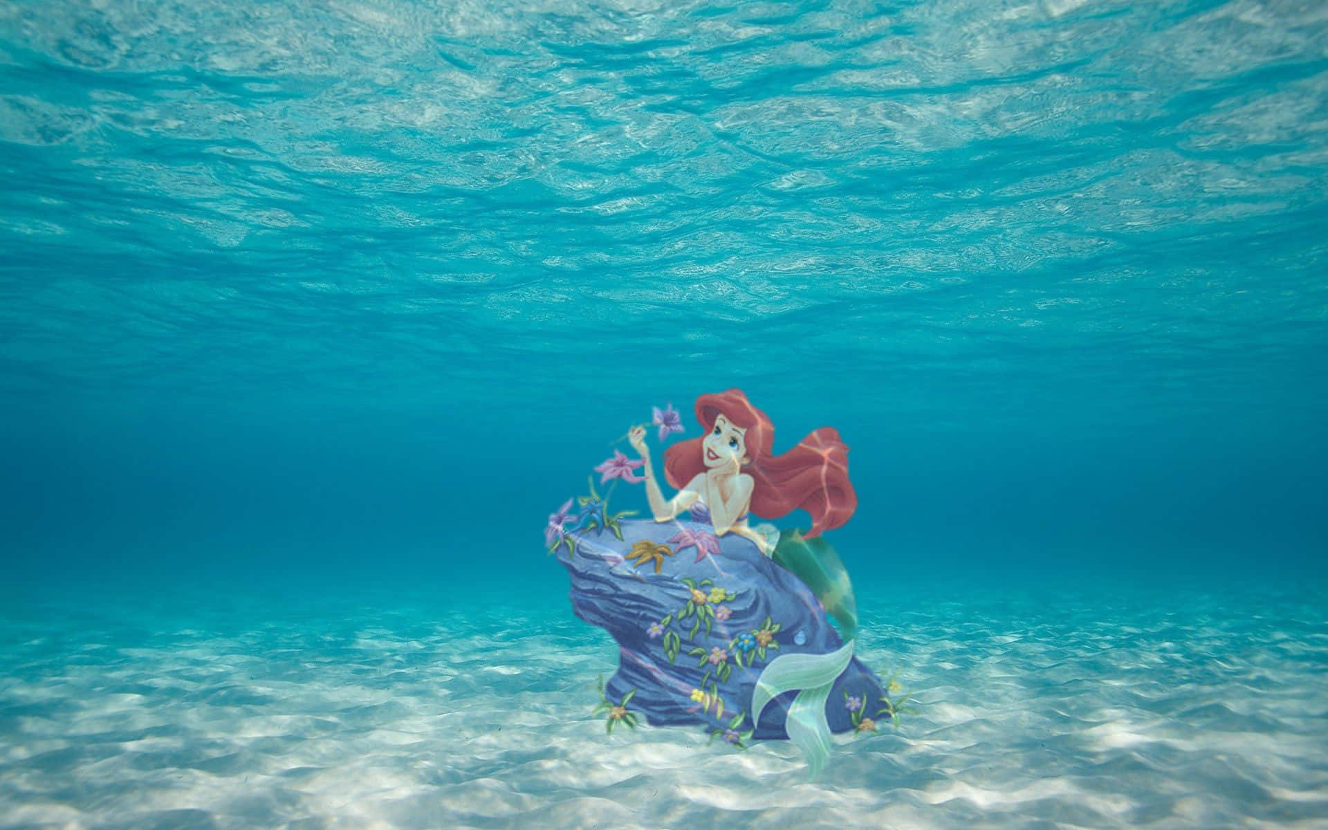 Ariel i havet med en båd og fisk Wallpaper