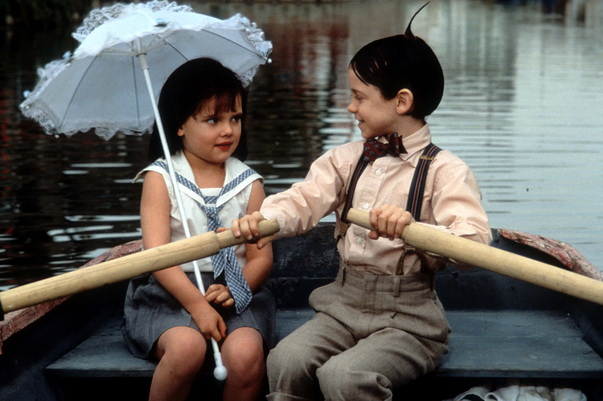 A Boy And Girl In A Boat