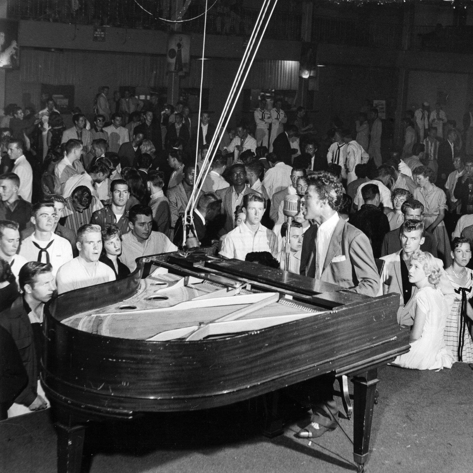 Little Richard Playing Piano 1955 Performance Wallpaper