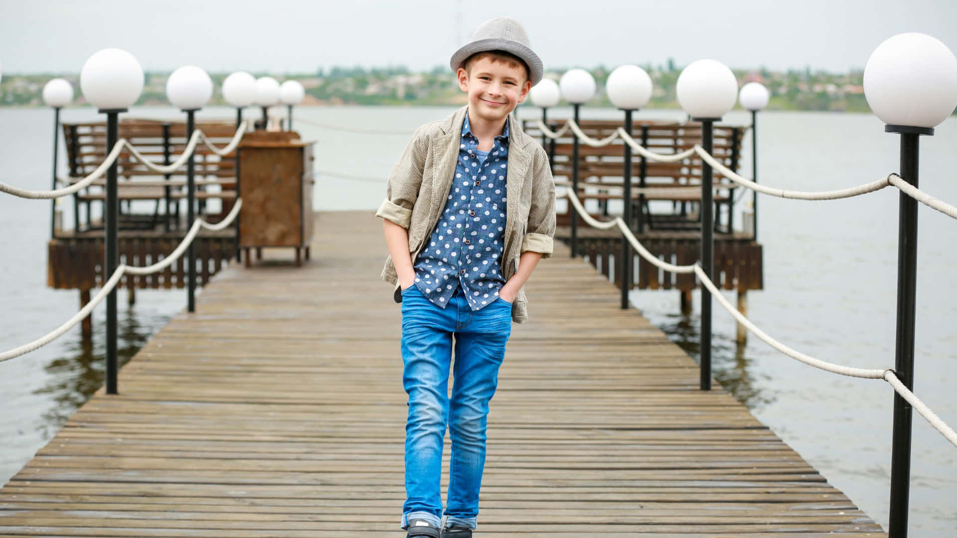Little Stylish Boy Outdoor Outfit Wallpaper