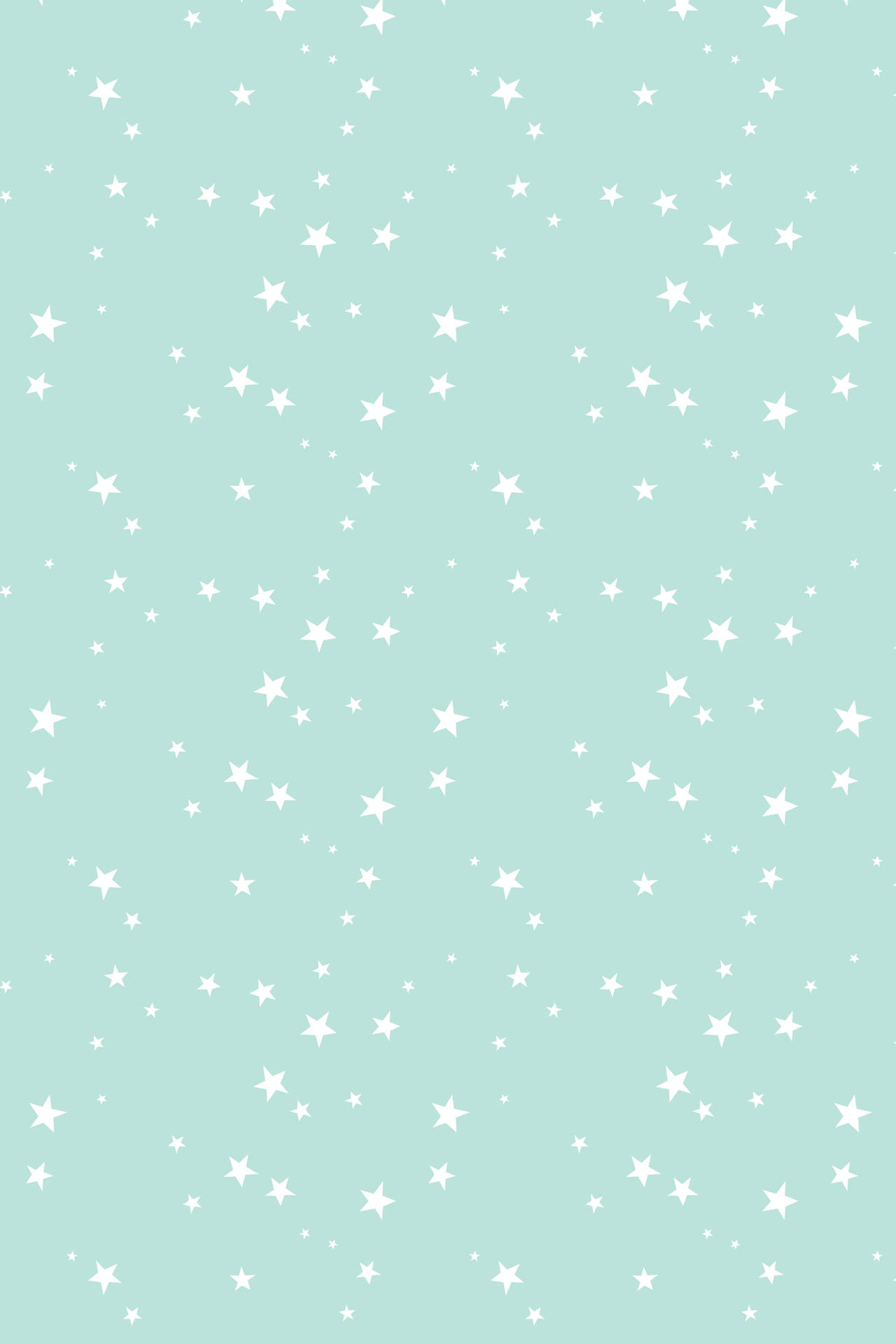 Små hvide stjerner på pastelgrøn Wallpaper
