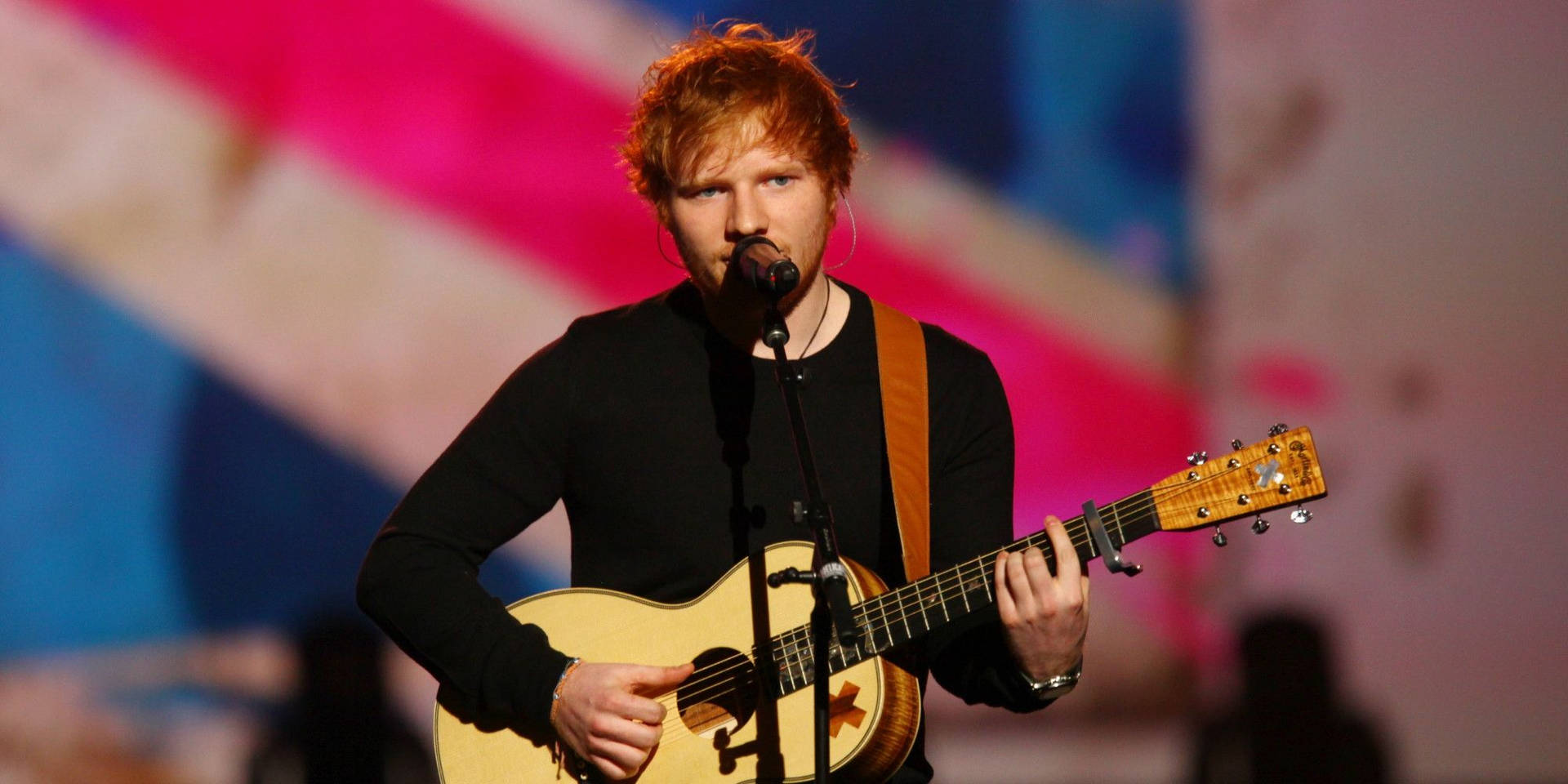 Ed Sheeran delivering an incredible live performance Wallpaper