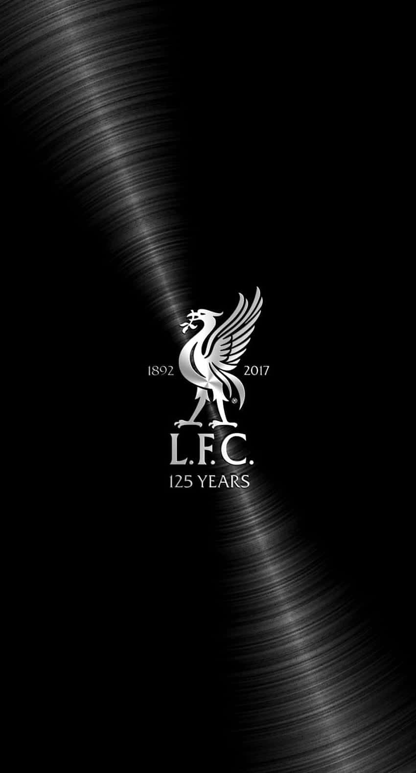 Et Liverpool FC-logo på en sort baggrund Wallpaper
