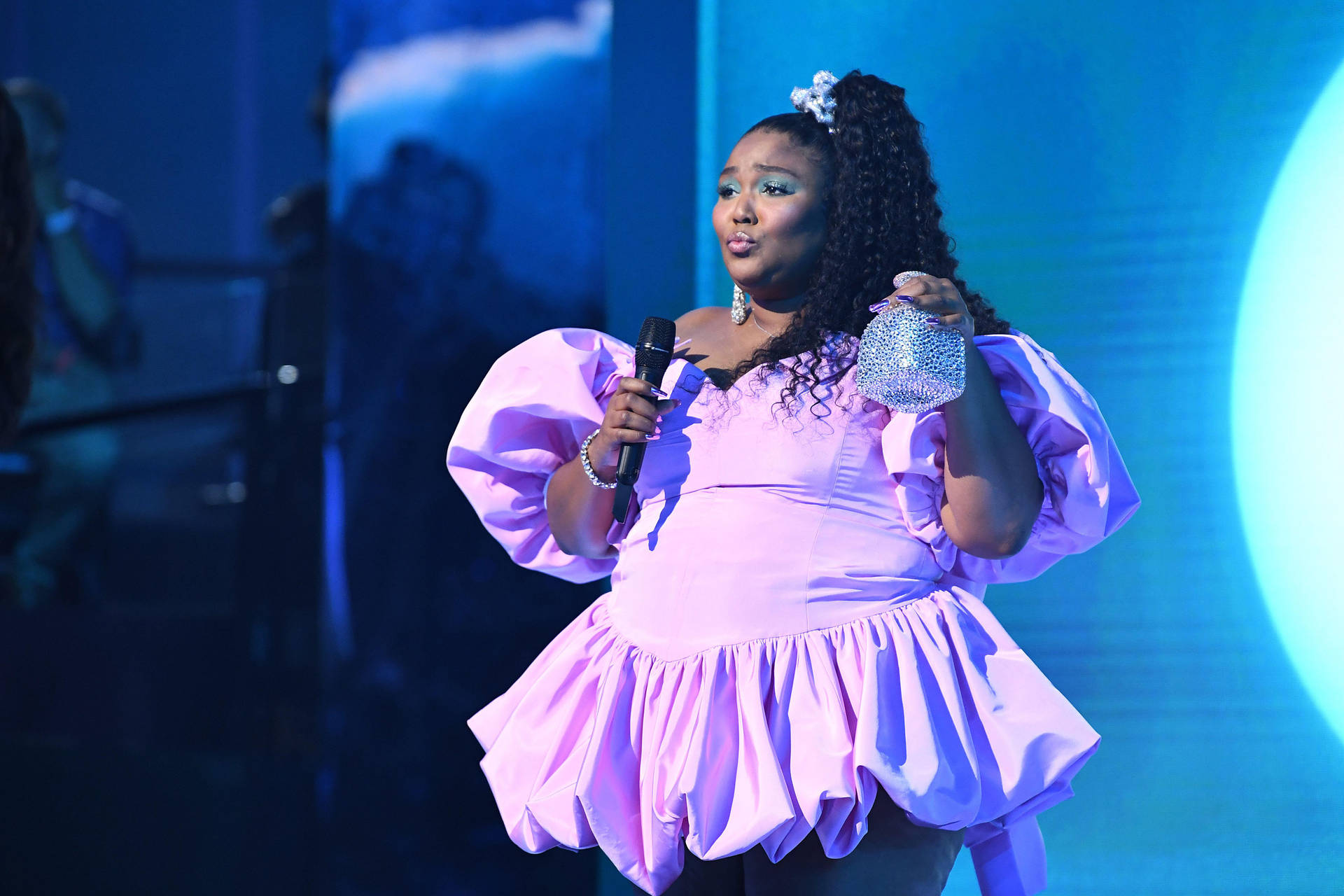 Lizzo In Marc Jacobs Dress Background