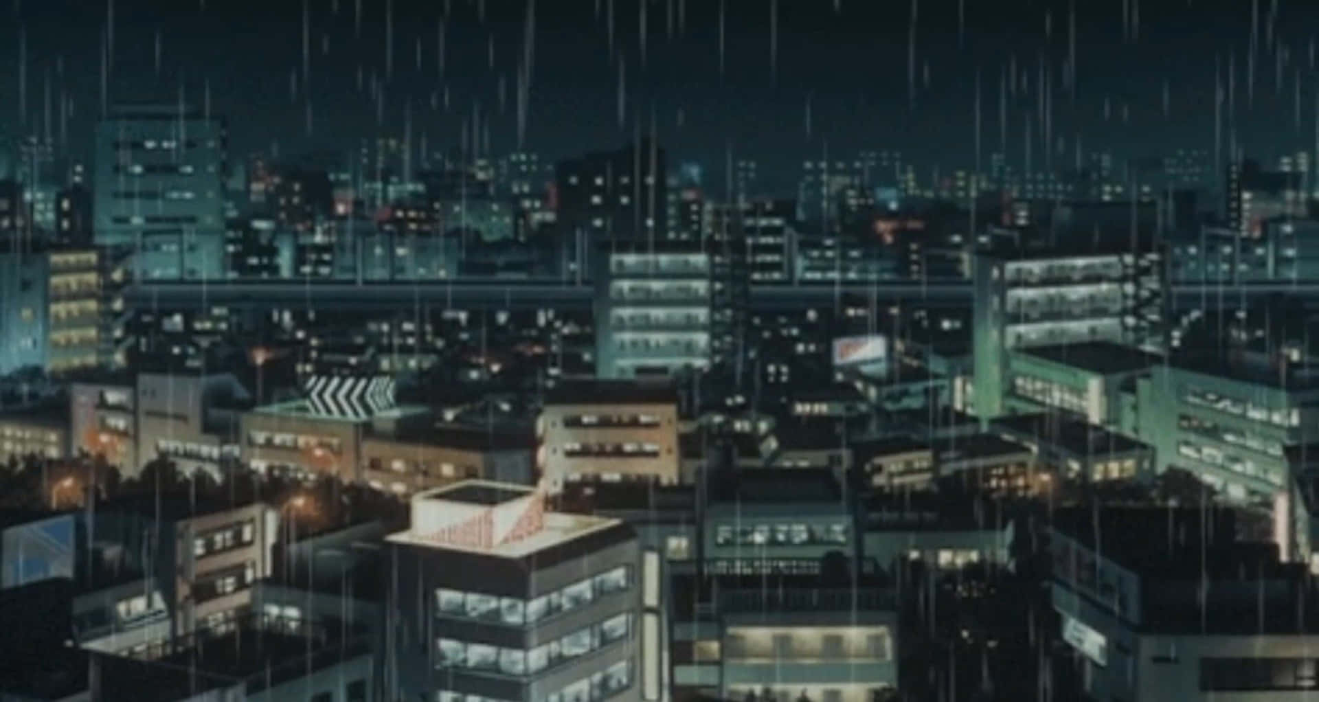 A City With Buildings And Rain In The Background Wallpaper
