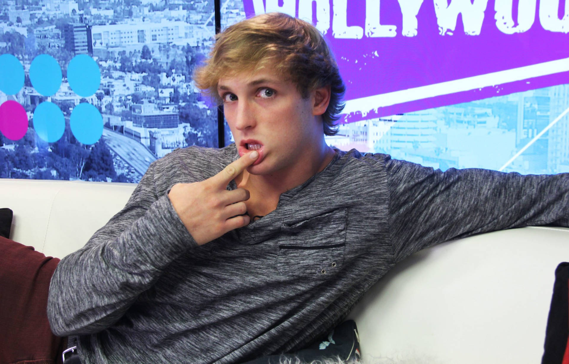 Logan Paul Being Witty And Playful Wallpaper