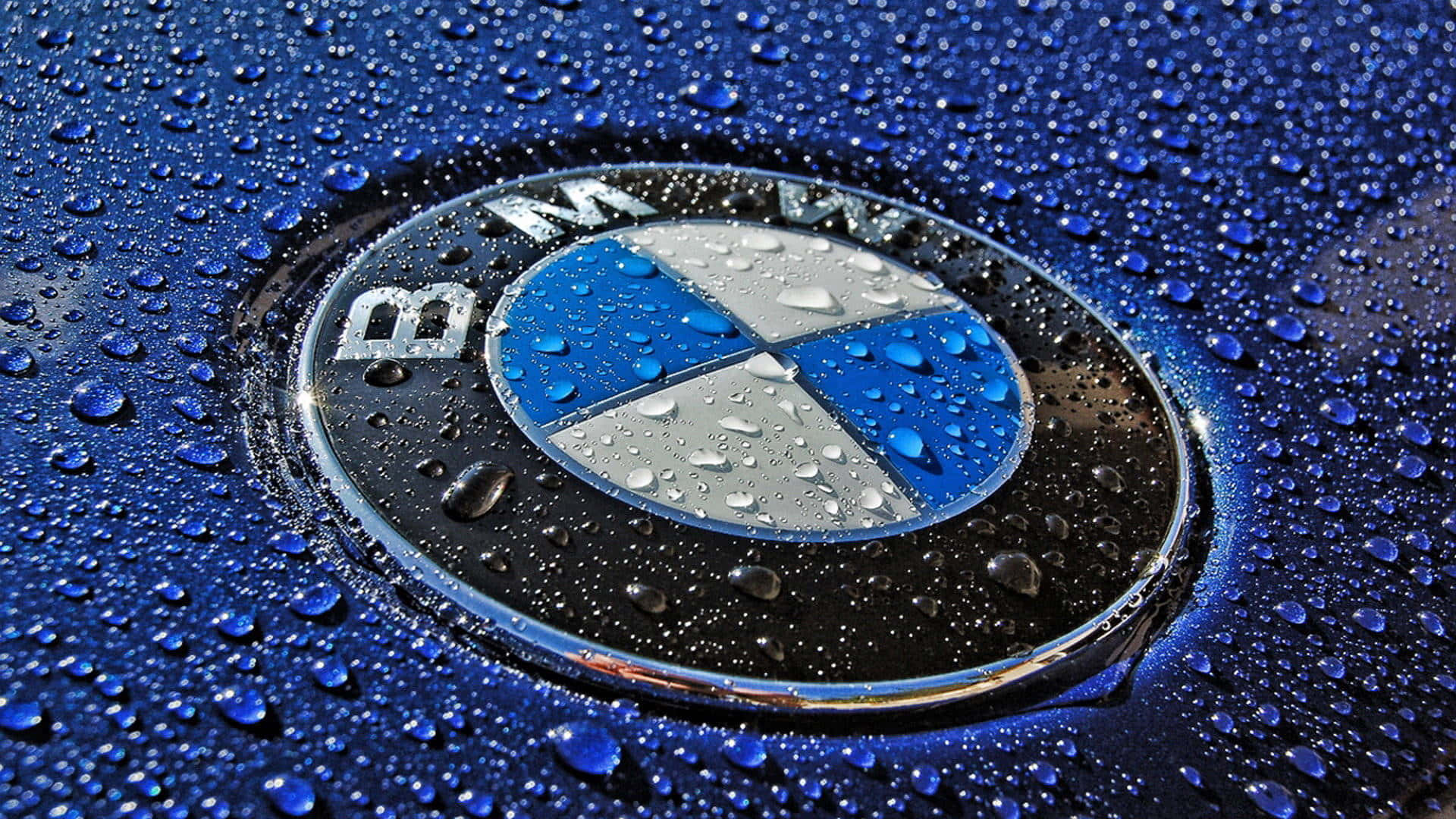 Bmw Logo With Water Drops On It