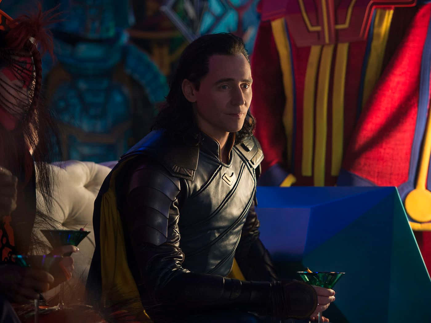 Loki, The God of Mischief, standing tall and intense in the mystical land of Asgard