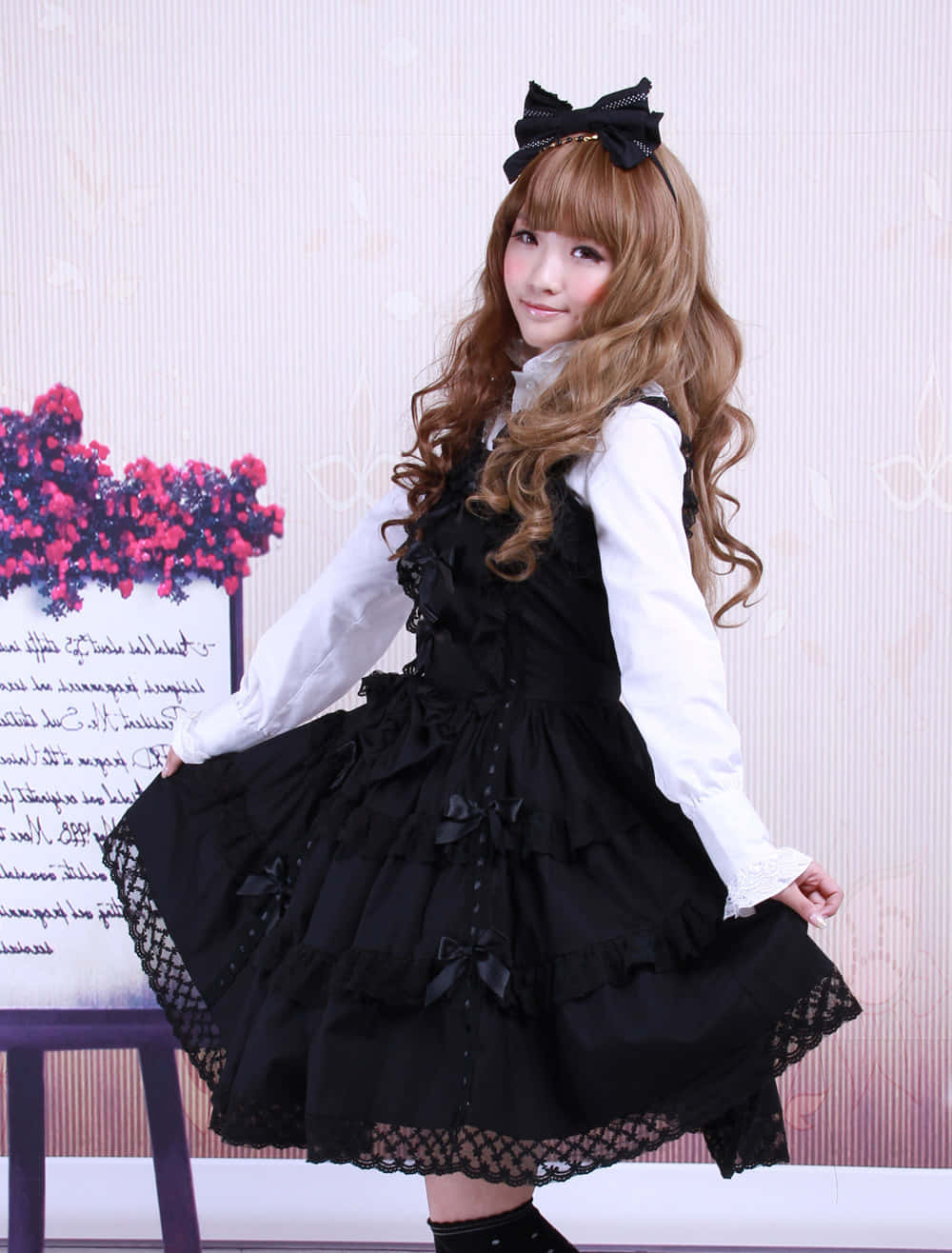 Elegant Lolita Fashionista Posing in a Beautiful Dress Wallpaper