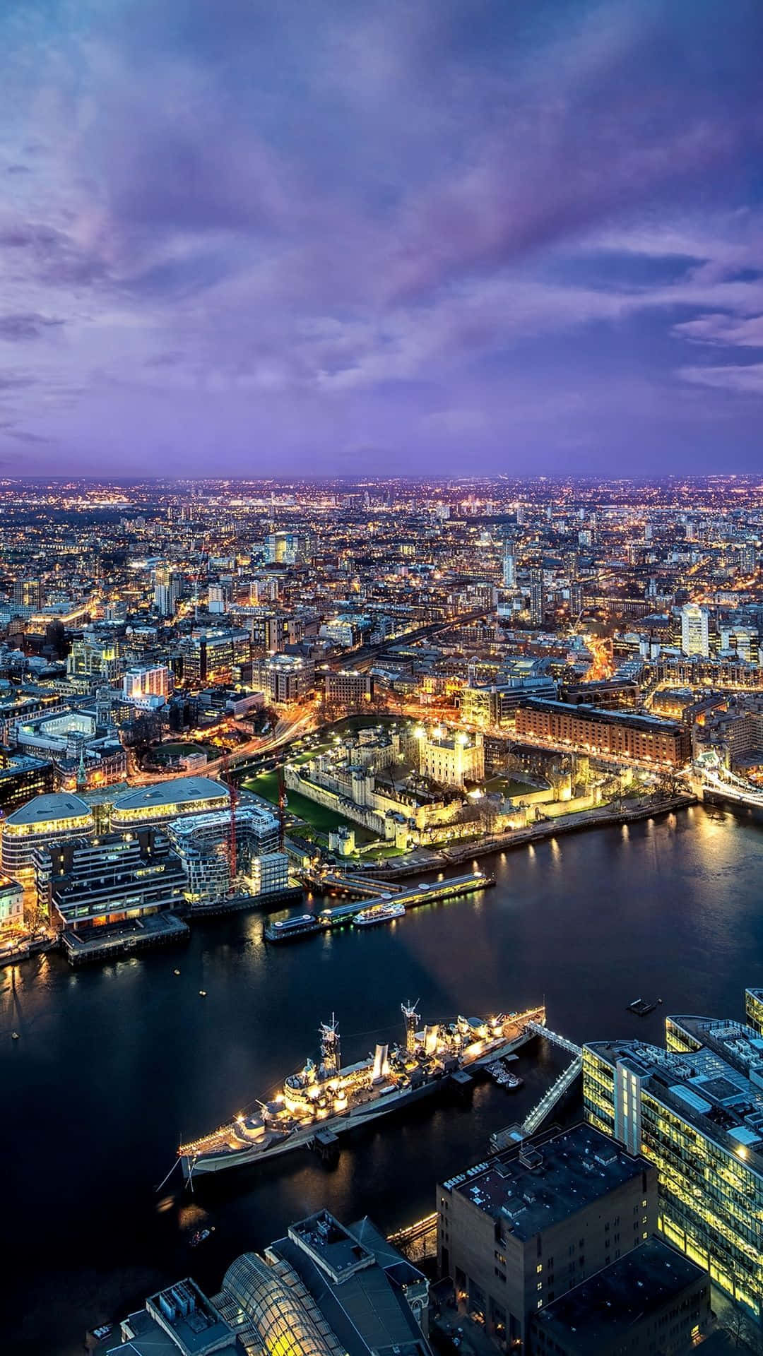 A View Of The City Of London At Night Wallpaper