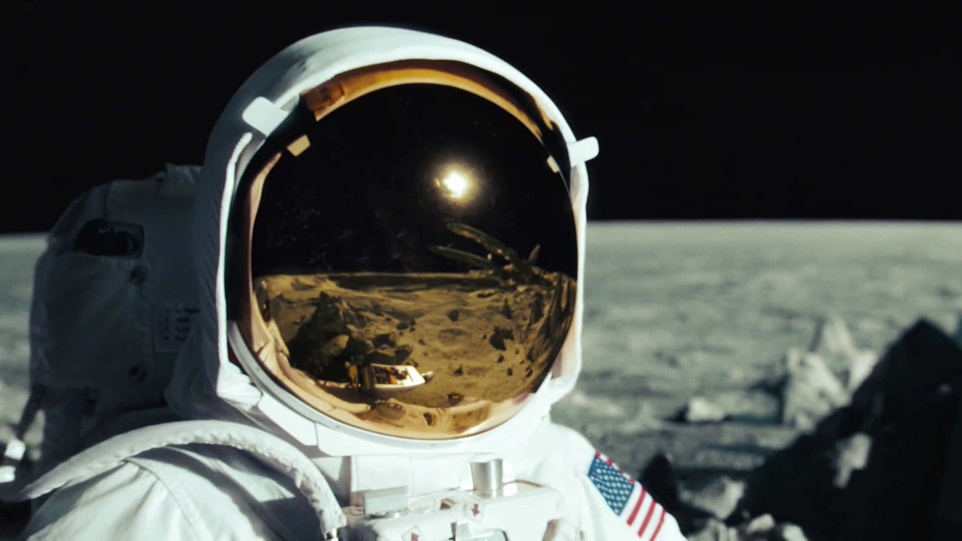 Lone Astronaut Exploring The Moon's Surface Wallpaper