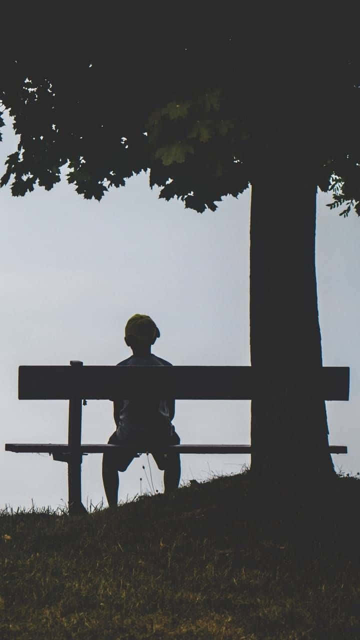 boy standing alone silhouette