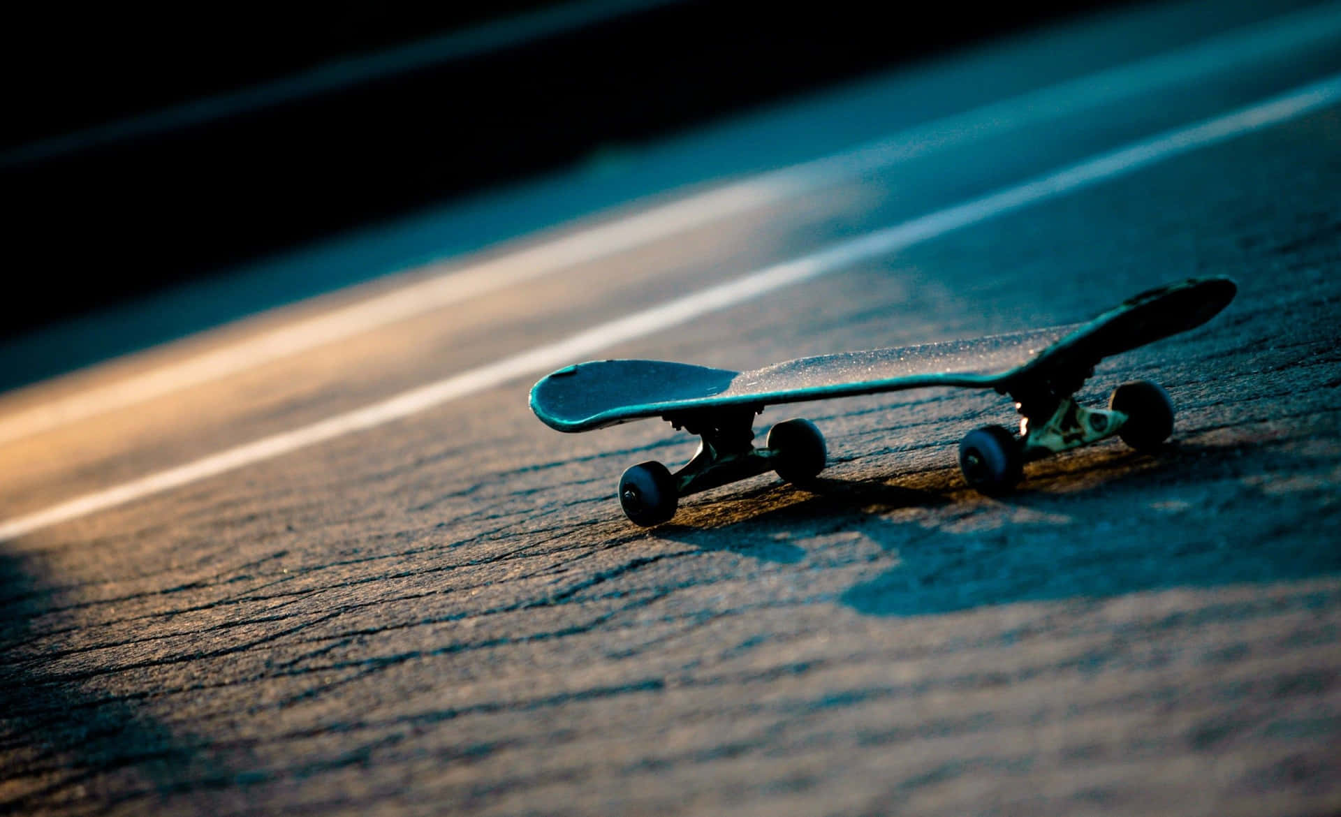 Lonely Skateboardat Dusk.jpg Wallpaper