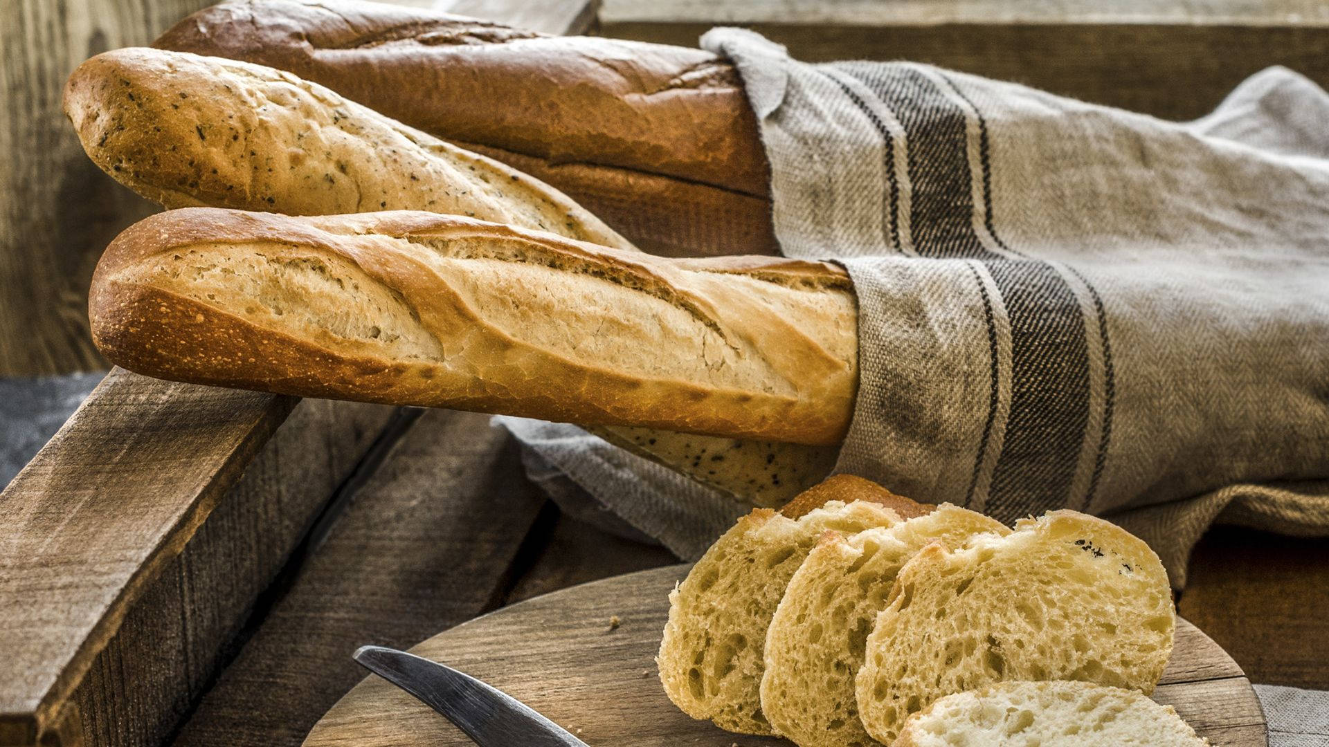 Array of Freshly Baked Long Breads Wallpaper