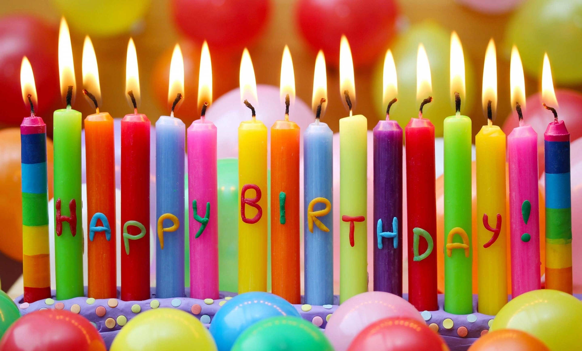 Long Colorful Birthday Cake Candles Wallpaper