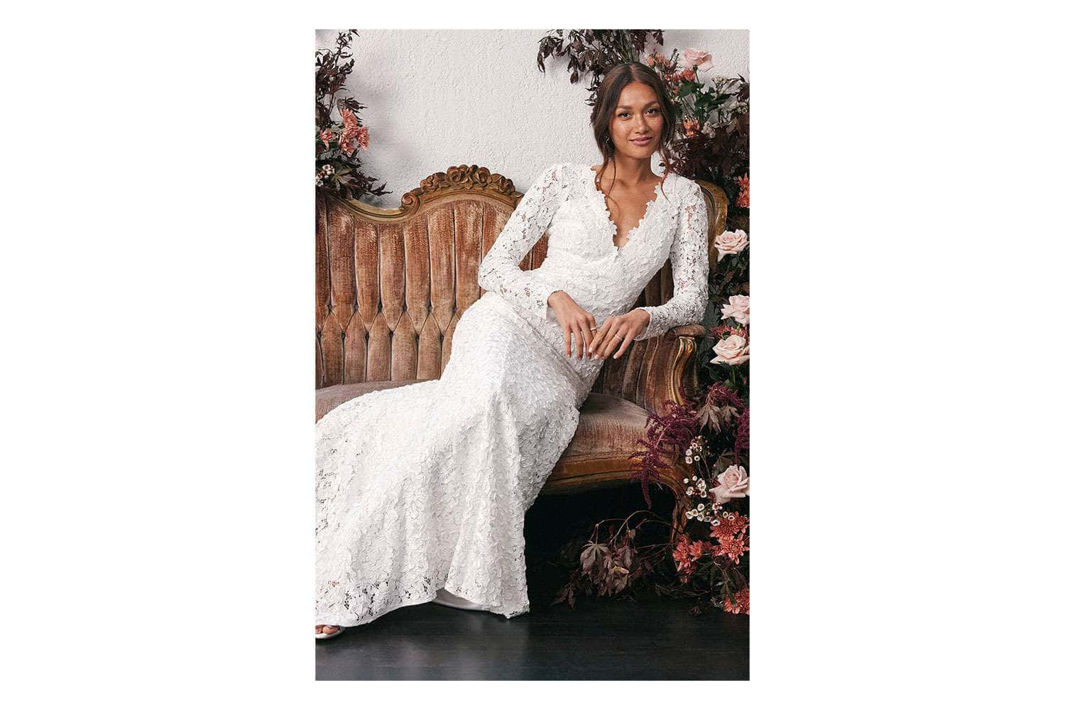 Bride In A Long Wedding Dress Sitting Picture
