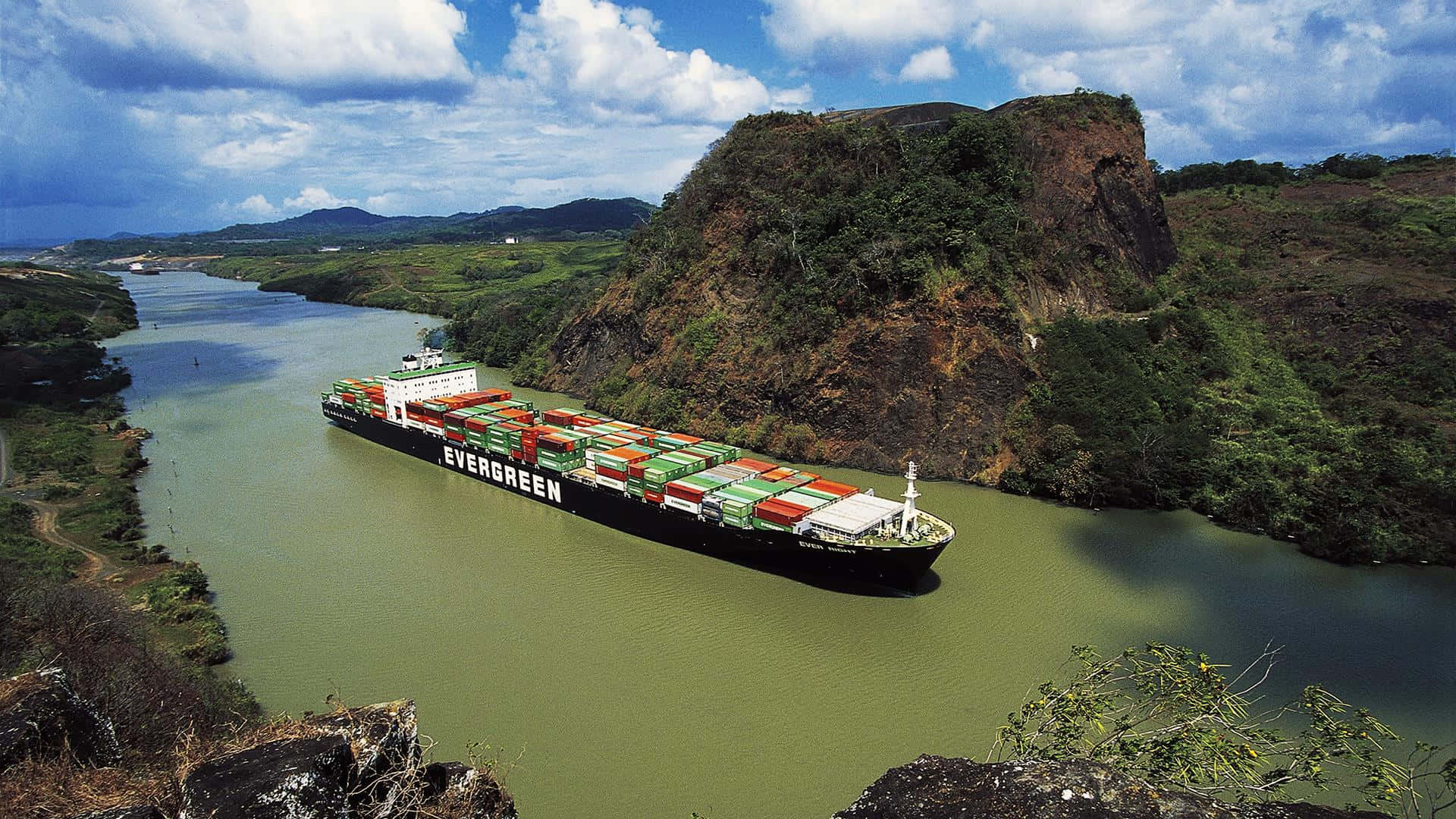 Majestic Freight Ship Sailing Across the Panama Canal Wallpaper
