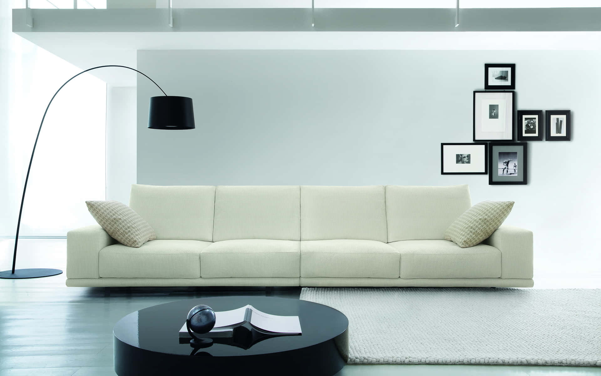 Minimalistic Long White Couch in a Modern Living Room Wallpaper