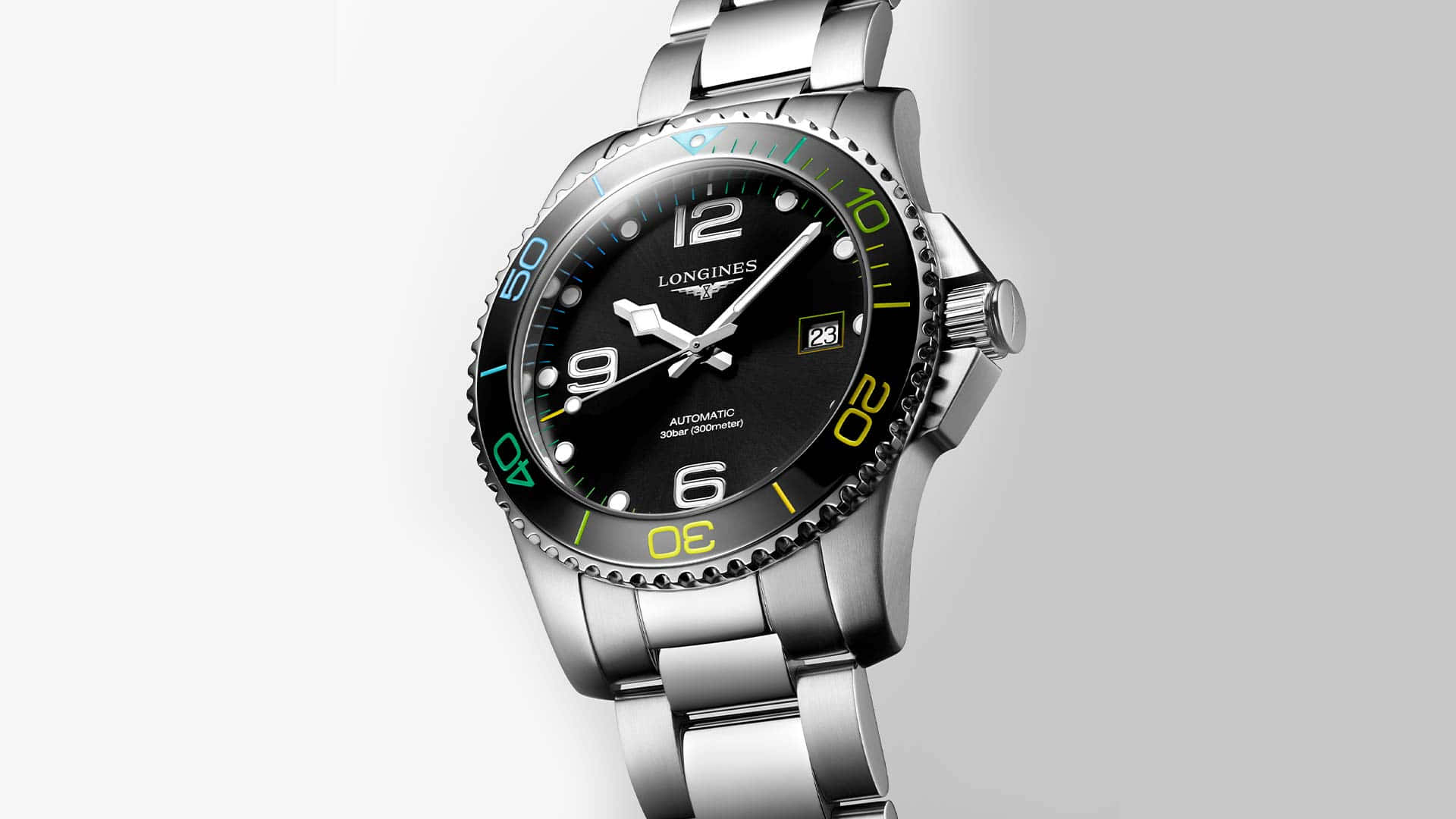 Caption: An Elegant Longines Silver Watch with Colored Bezel Wallpaper