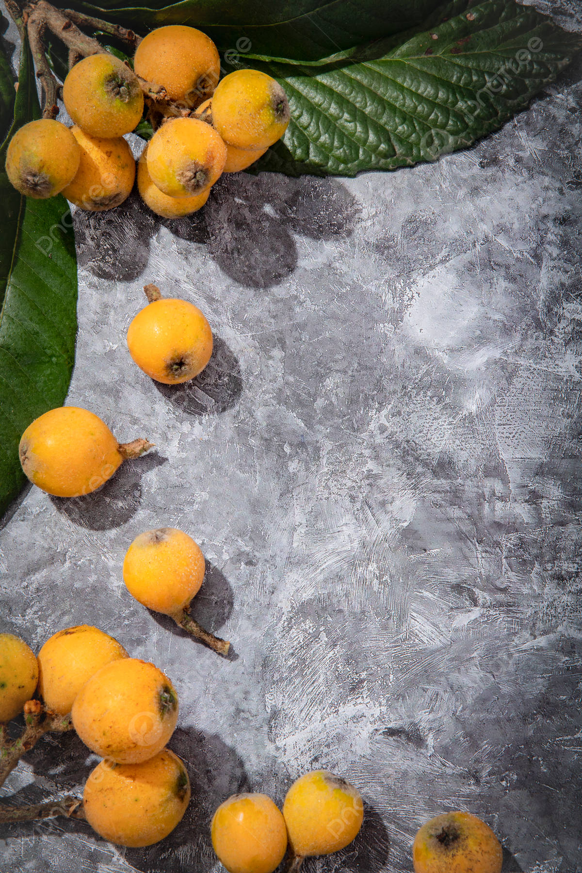 Loquat Fruits On Gray Table Wallpaper