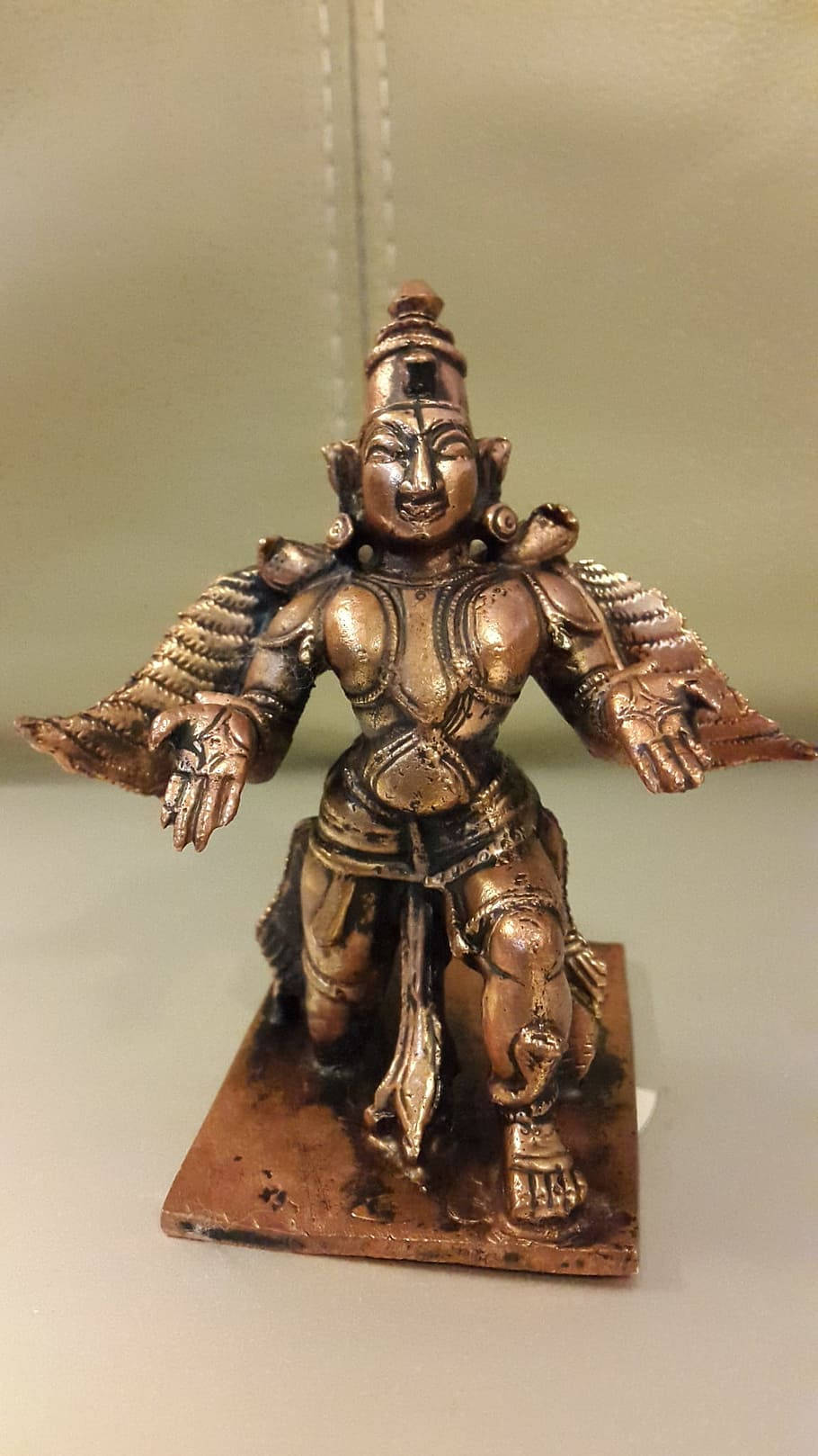 Lord Garuda Statue On Pedestal Background
