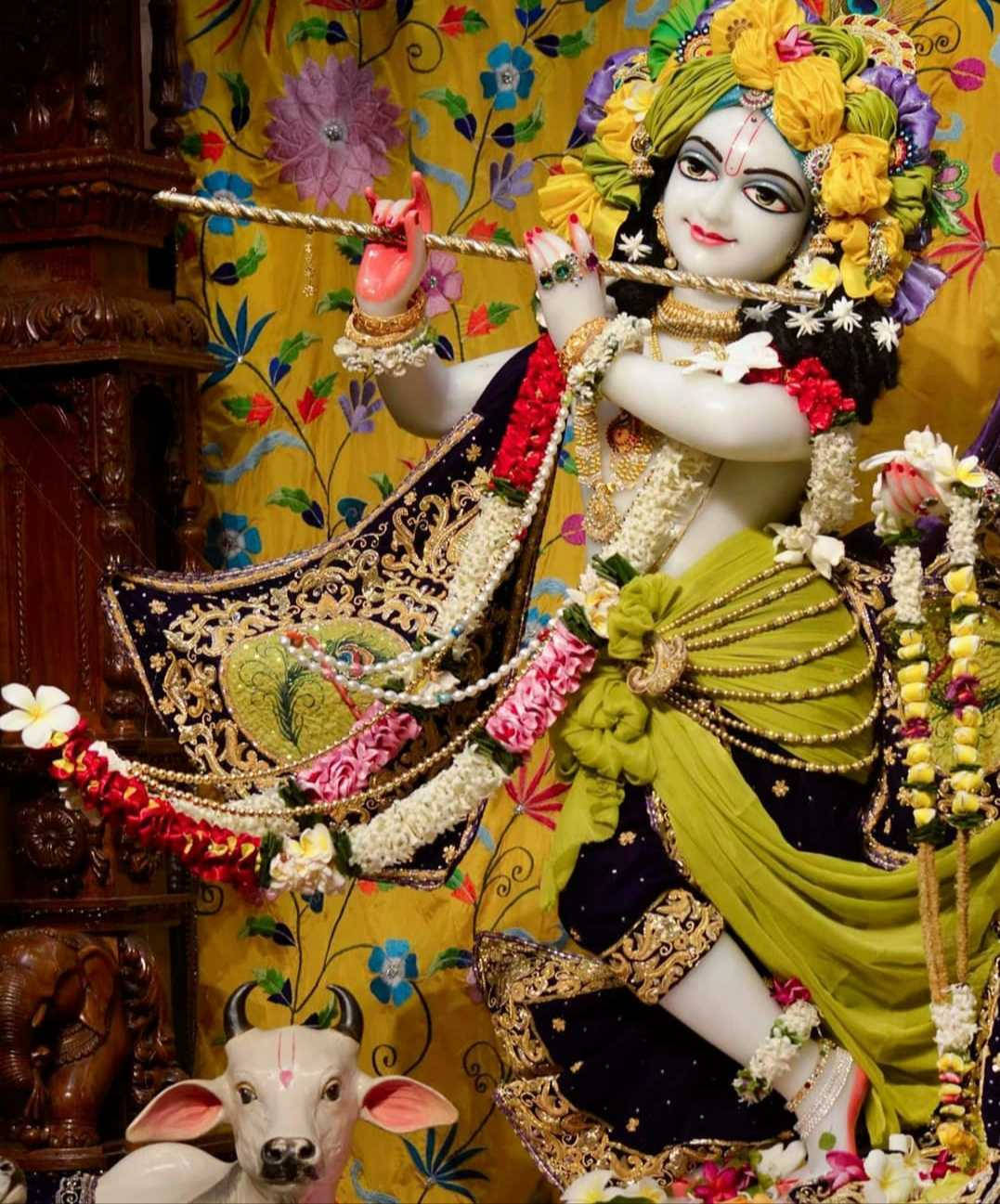 Herre Krishnas skulptur som en ISKCON hyldest Wallpaper