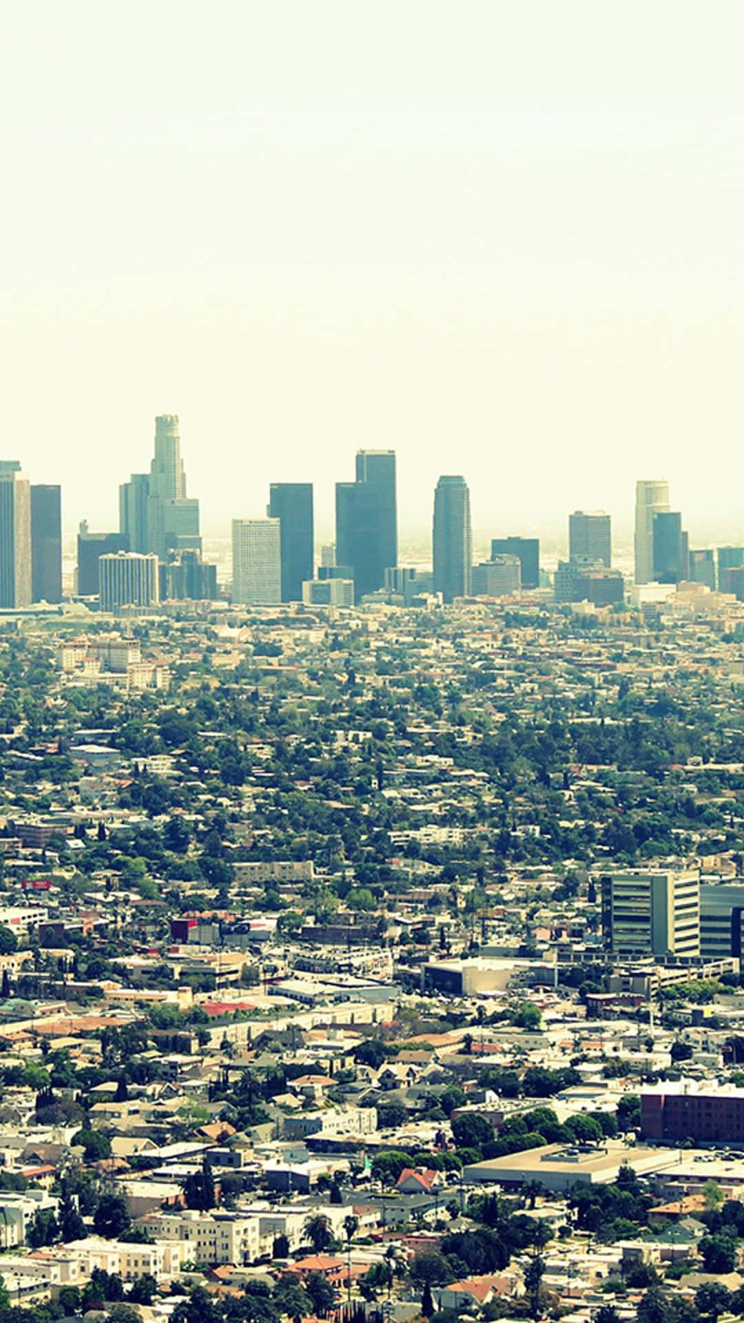 Horizontede Los Ángeles Iluminado Con Un Iphone Fondo de pantalla