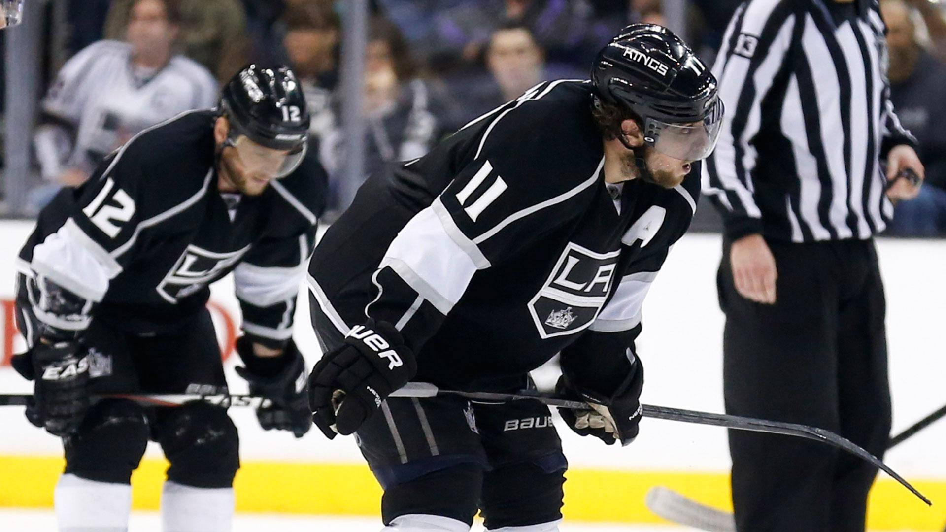 Los Angeles Kings' Players Anze Kopitar and Trevor Moore in Action Wallpaper