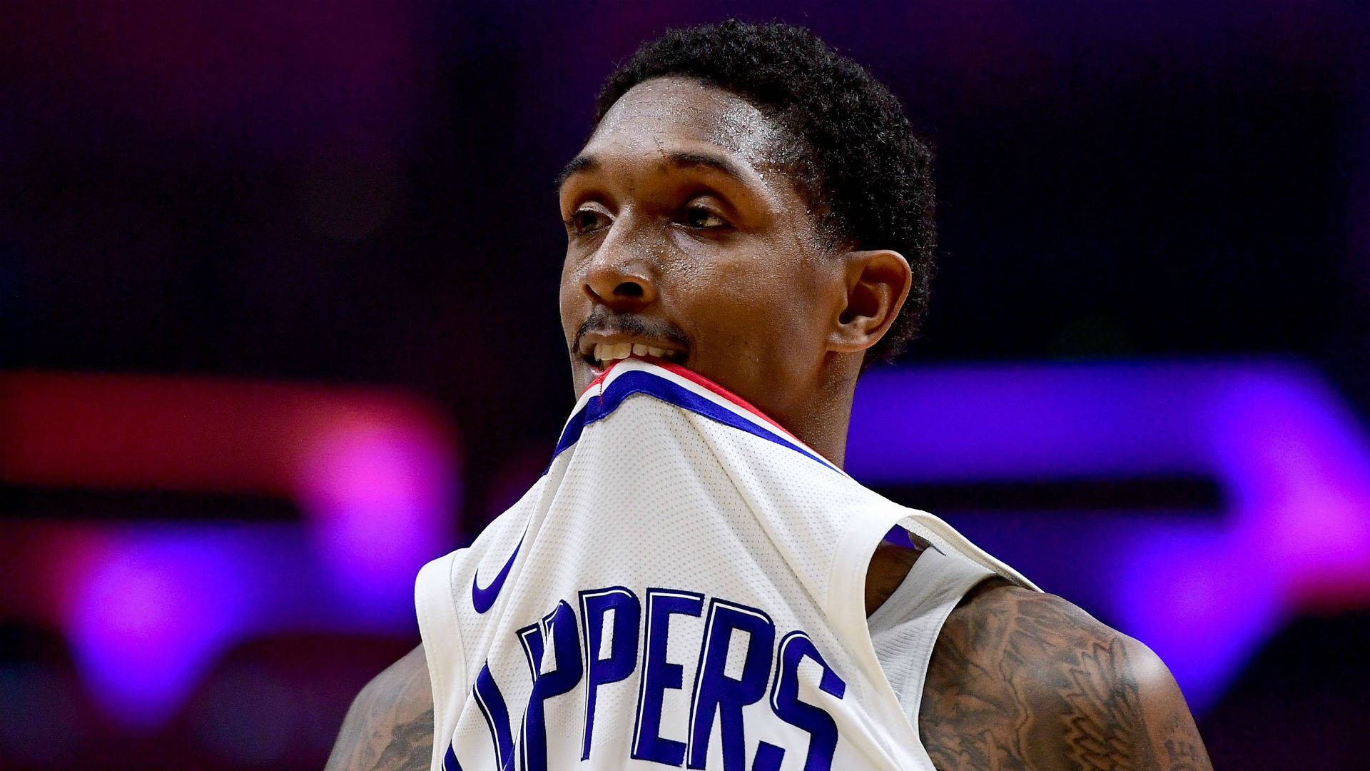 Download Lou Williams Bright Blue Clippers Jersey Wallpaper