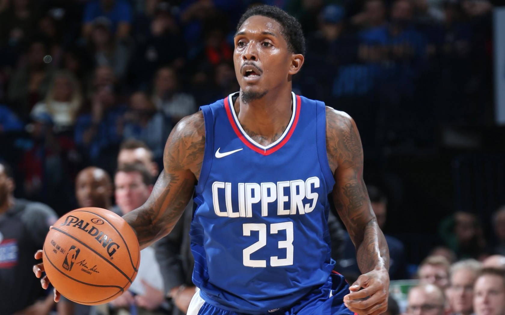 Download Lou Williams Bright Blue Clippers Jersey Wallpaper