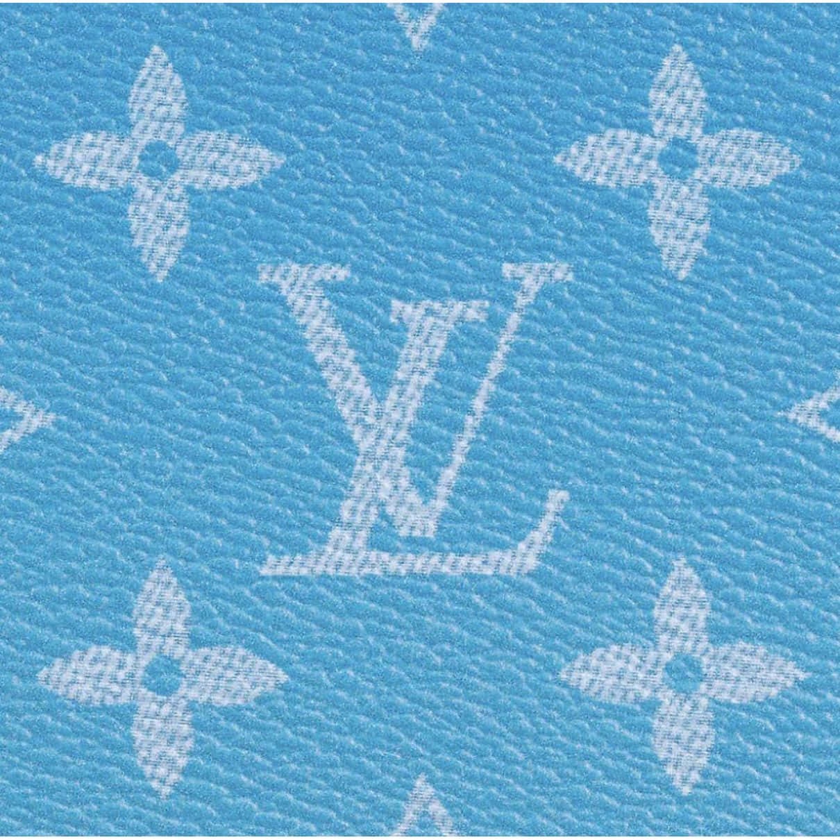 Make heads turn with the trending ombre blue Louis Vuitton bag. Wallpaper