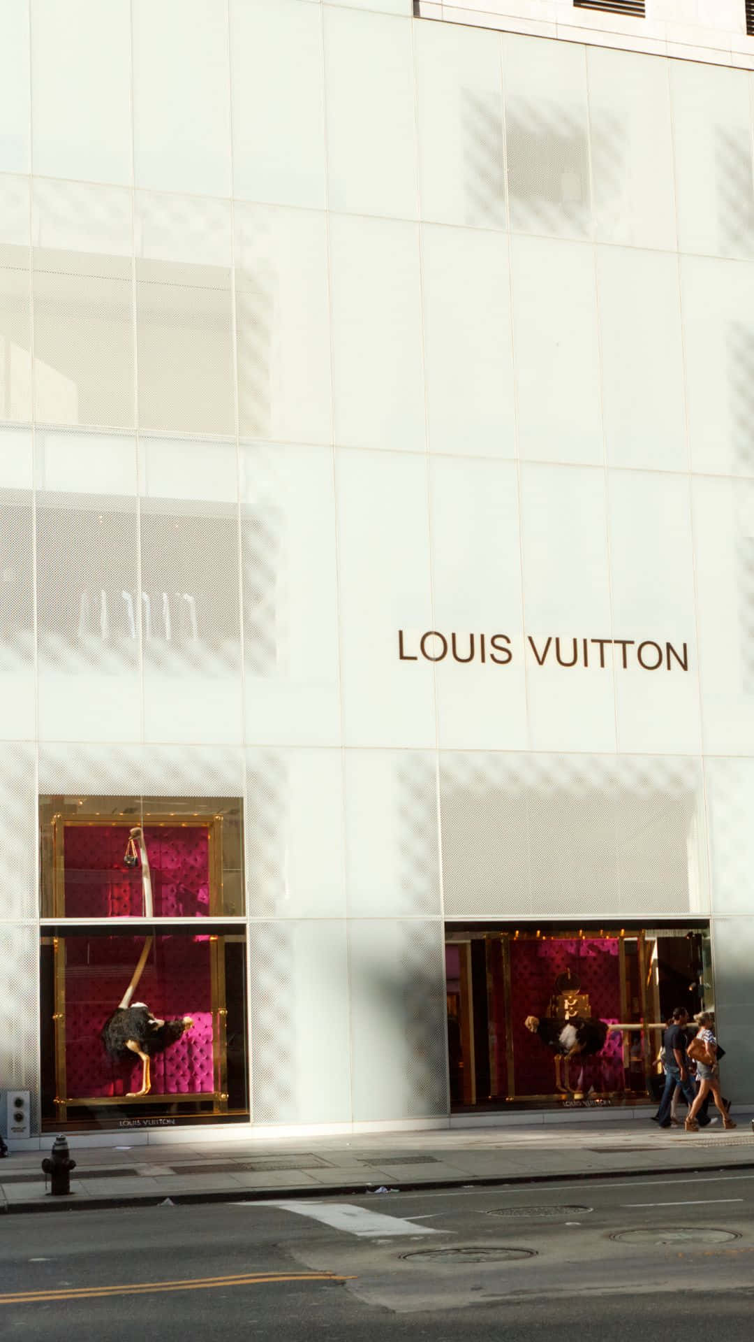 Gør et stilerklæring med denne glamourøse Louis Vuitton iPhone-etui. Wallpaper