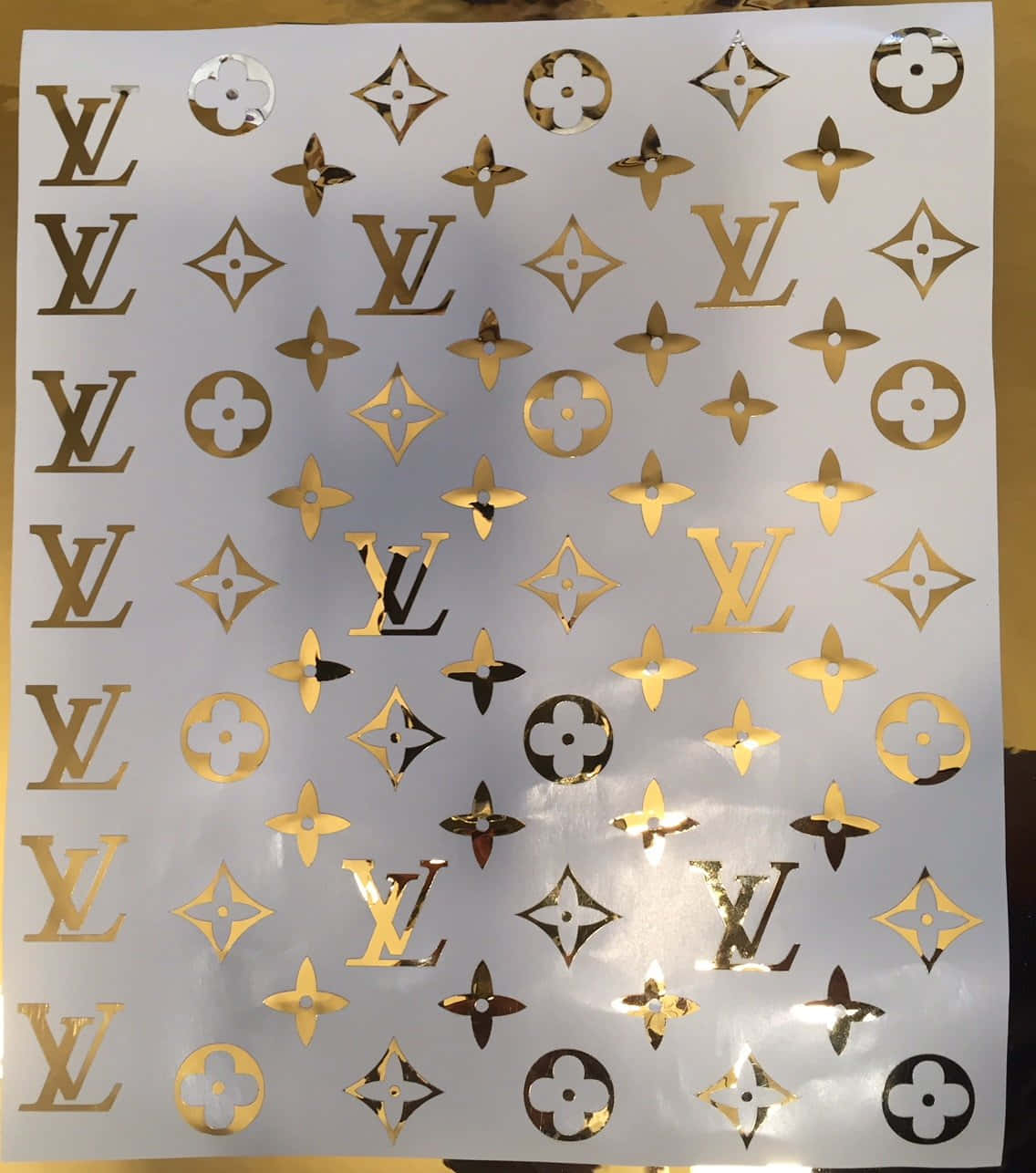 Download The iconic Louis Vuitton Logo. Wallpaper