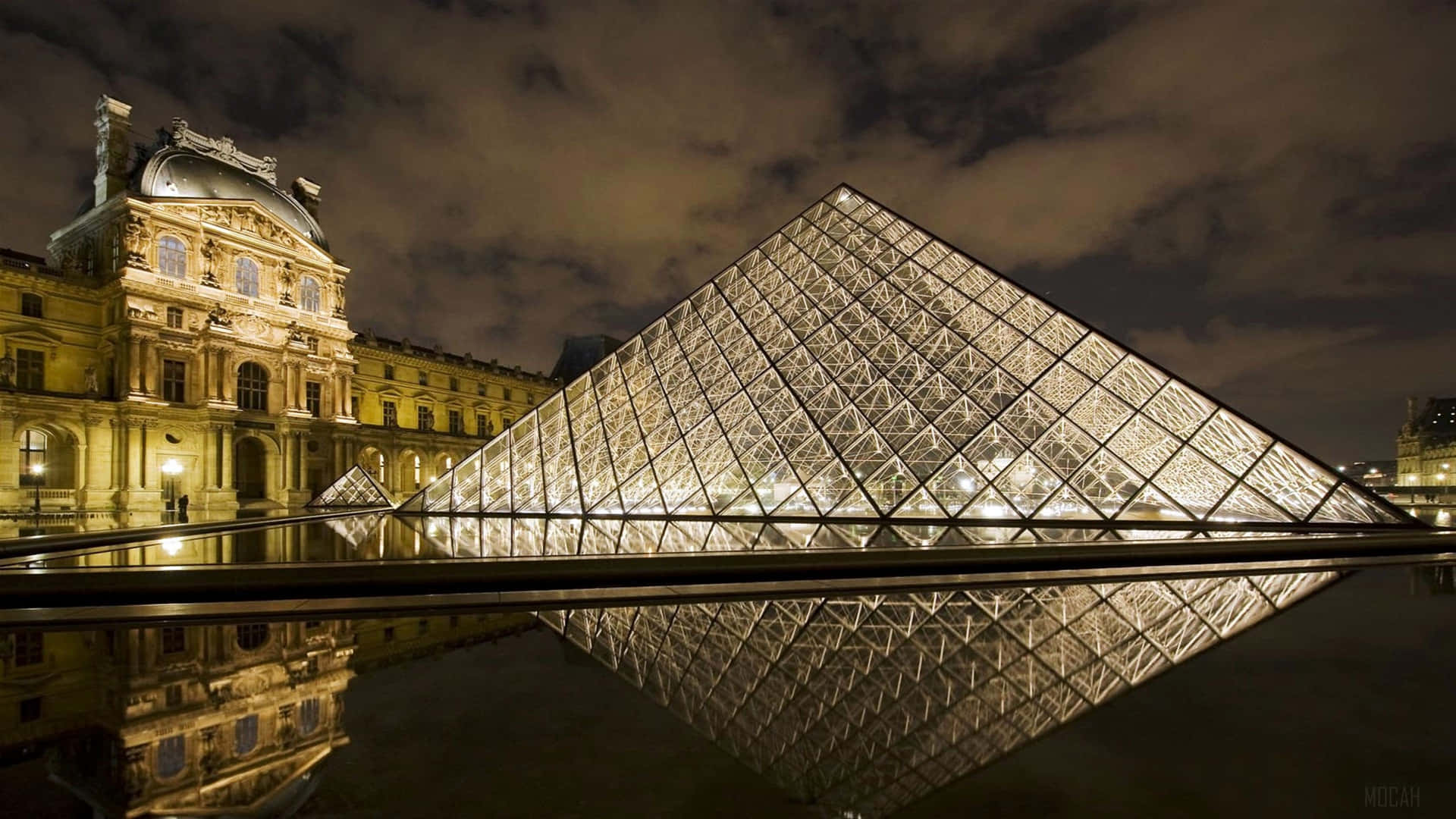 Louvre Museum Peaceful Night In Paris Background