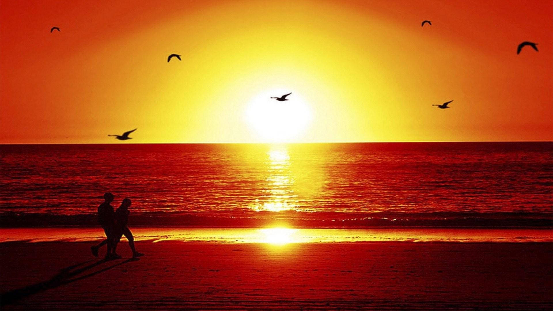 Lovers On Beach During Sunset Wallpaper